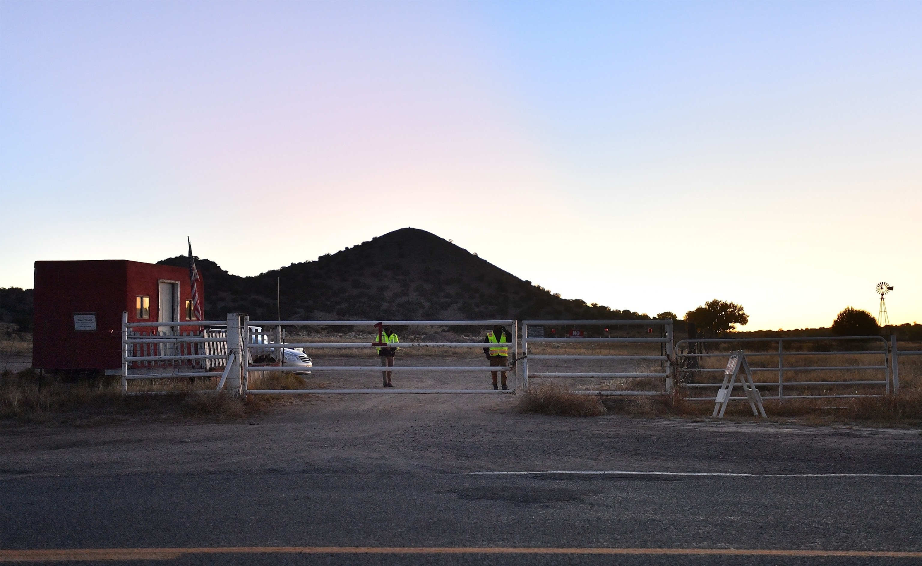 PHOTO: Security guards stand behind a locked gate at the entrance to the Bonanza Creek Ranch, Oct. 22, 2021, in Santa Fe, N.M. 
