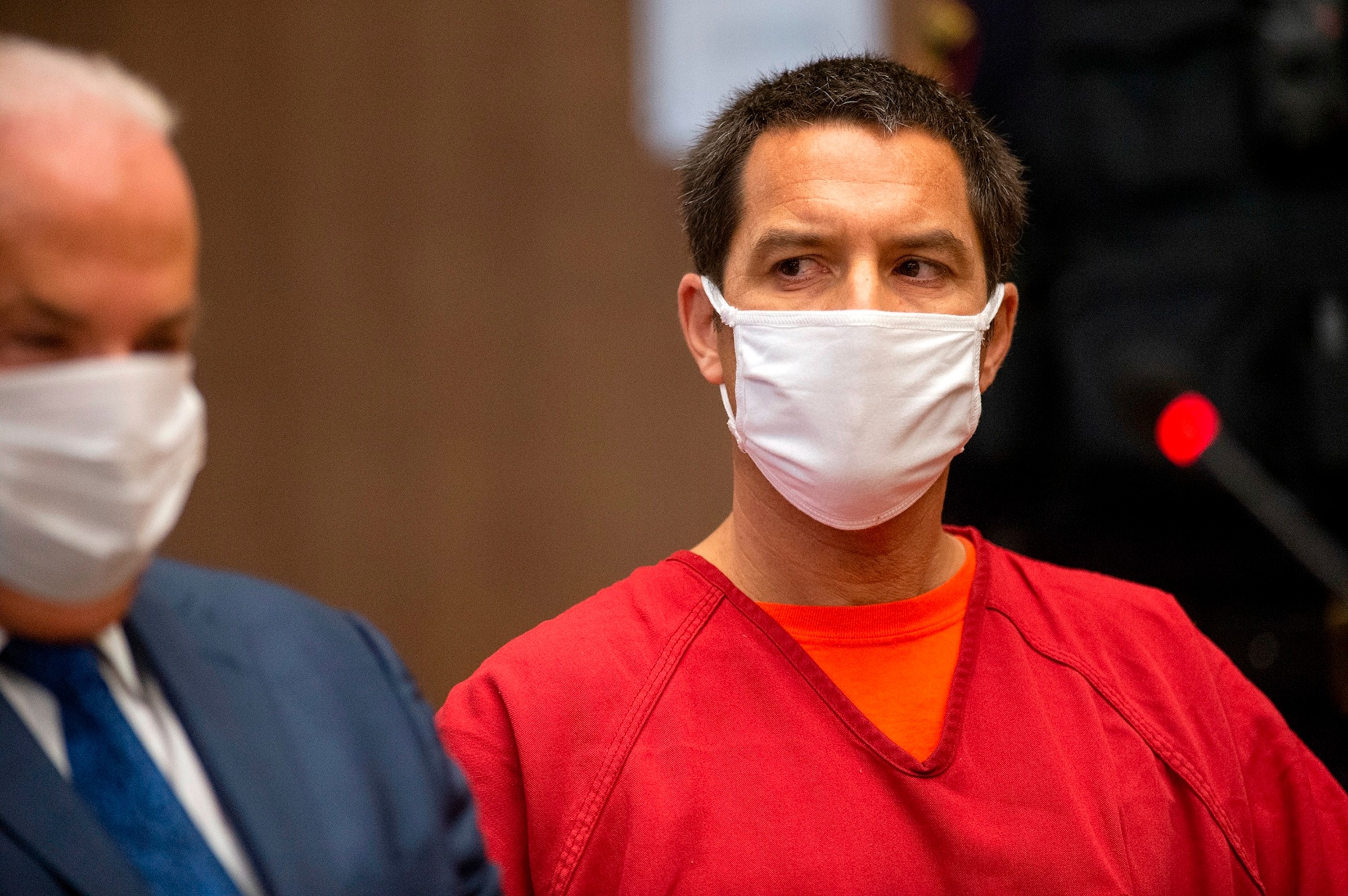 PHOTO: Scott Peterson listens to Stanislaus County Deputy District attorney Dave Harris speak during a hearing at the San Mateo County Superior Court in Redwood City, Calif., Dec. 8, 2021. 