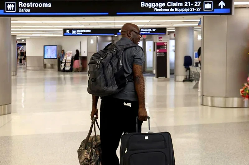 WORLD-NEWS-HAITI-EVACUATIONS-2-MI
The first evacuation flight out of Cap-Haitien, Haiti, landed at Miami International Airport on Sunday, March 17, 2024. Francius St. Alma of Miami was among the passengers. (Carl Juste/Miami Herald/Tribune News Service via Getty Images)