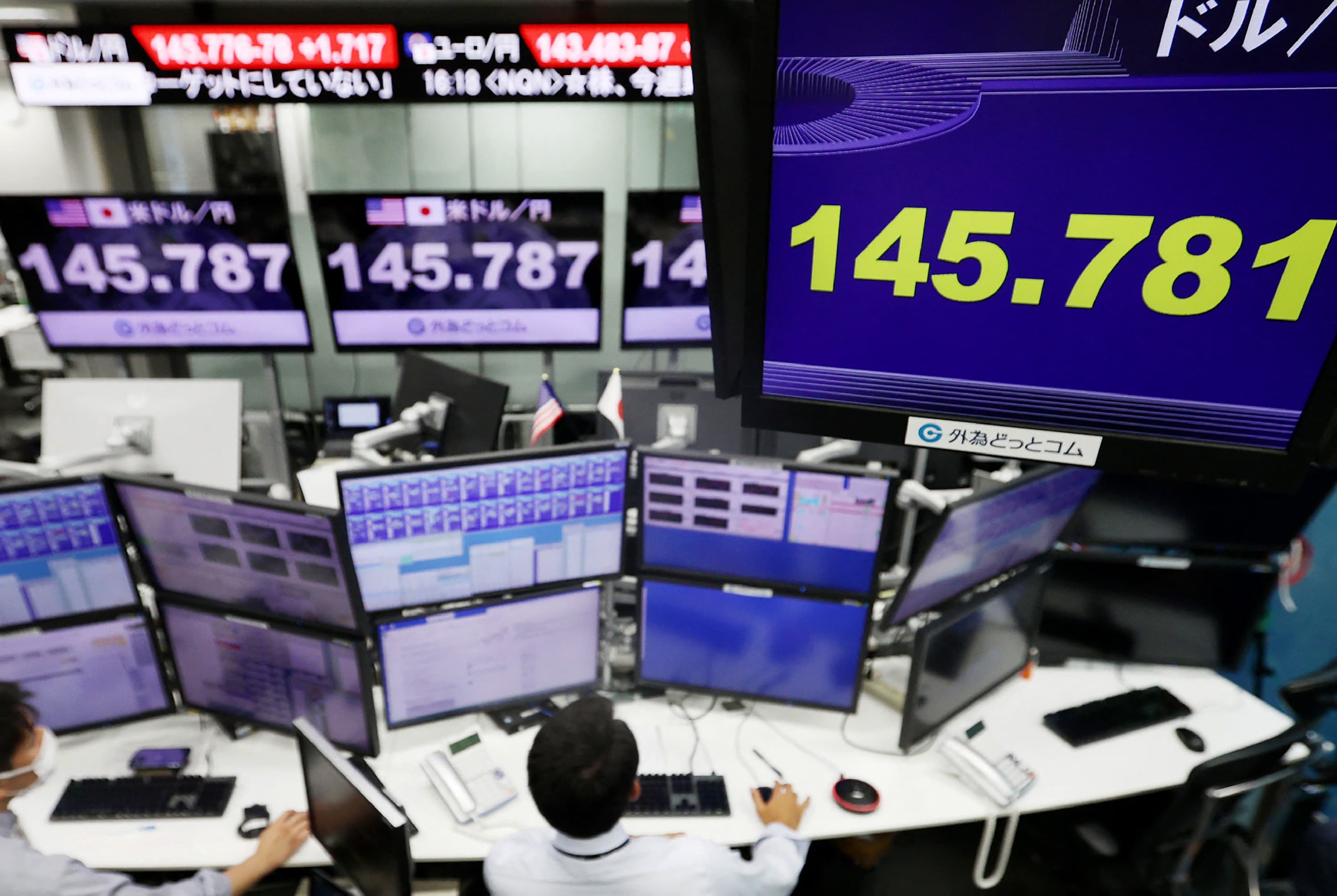 An electronic quotation board displays the yen's rate 145 yen level against the US dollar at a foreign exchange brokerage in Tokyo on September 22, 2022.
