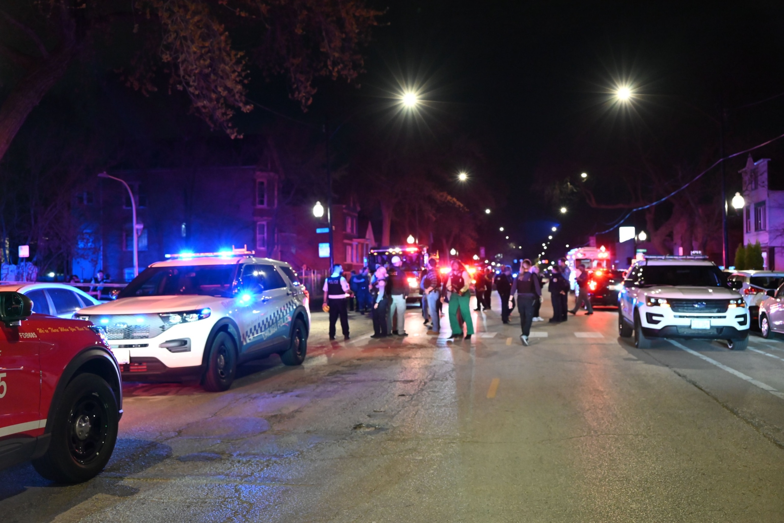 PHOTO: Chicago Police are rushing to the scene of a mass shooting on Saturday evening in the area of West 52nd Street in Chicago, IL, April 13, 2024. 