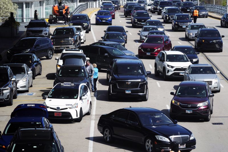 Heavy traffic is seen at O'Hare International Airport in Chicago, Monday, April 15, 2024. Pro-Palestinian demonstrators blocked a freeway leading to three Chicago O'Hare International Airport terminals Monday morning, temporarily stopping vehicle traffic into one of the nation's busiest airports and causing headaches for travelers. (AP Photo/Nam Y. Huh)