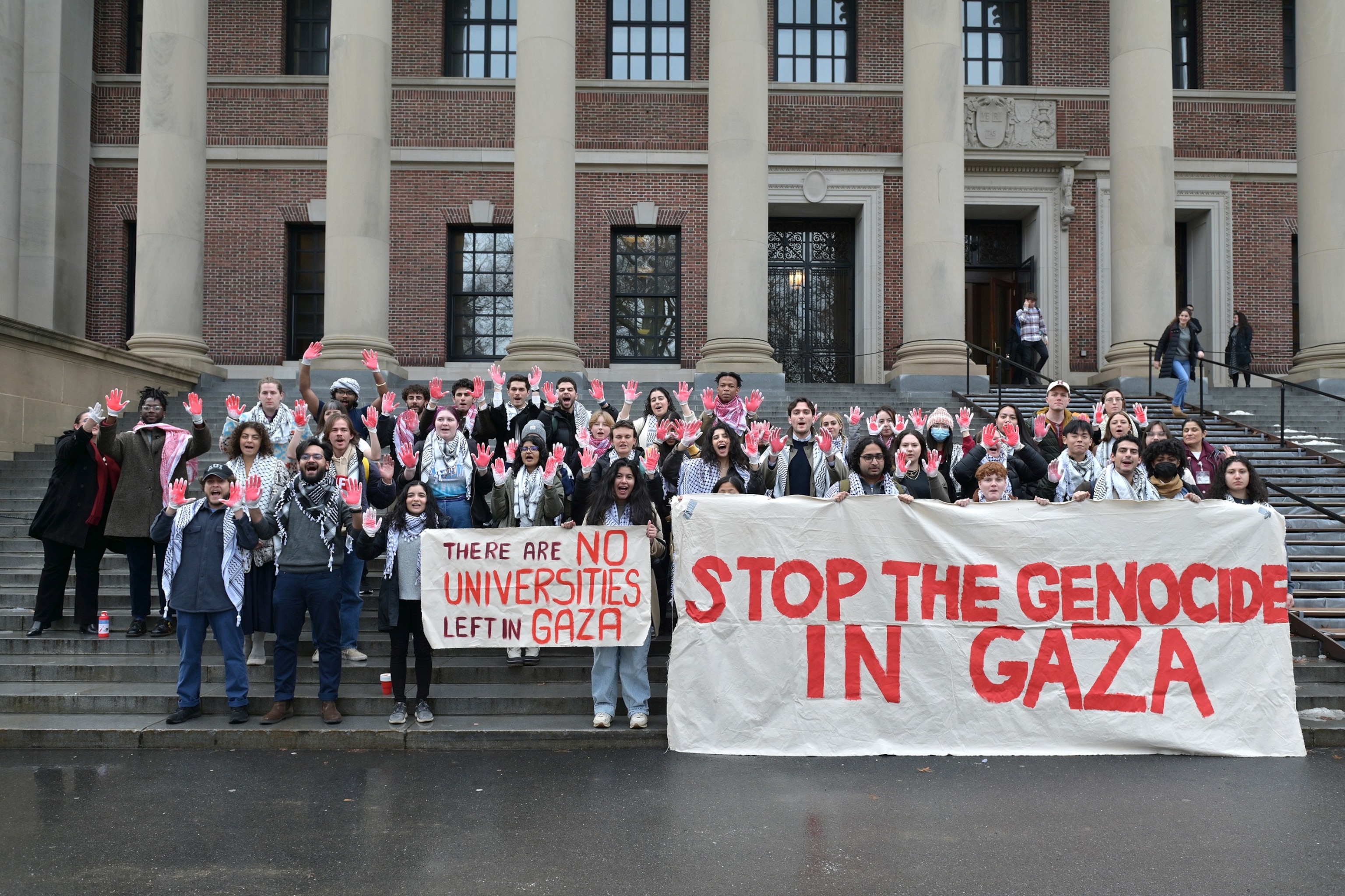 PHOTO: In this Jan. 25, 2024, file photo, Harvard students take part in a demonstration in support of Palestinians on the steps of the Widener Library in Harvard Yard, in Cambridge, Mass.