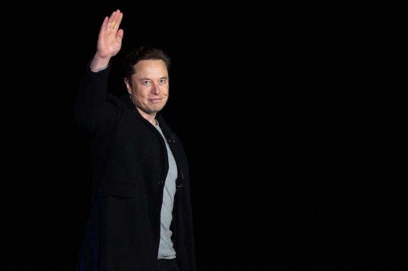 Elon Musk gestures as he speaks during a press conference at SpaceX's Starbase facility near Boca Chica Village in South Texas on February 10, 2022. - Billionaire entrepreneur Elon Musk delivered an eagerly-awaited update on SpaceX's Starship, a prototype rocket the company is developing for crewed interplanetary exploration. (Photo by JIM WATSON / AFP) (Photo by JIM WATSON/AFP via Getty Images)