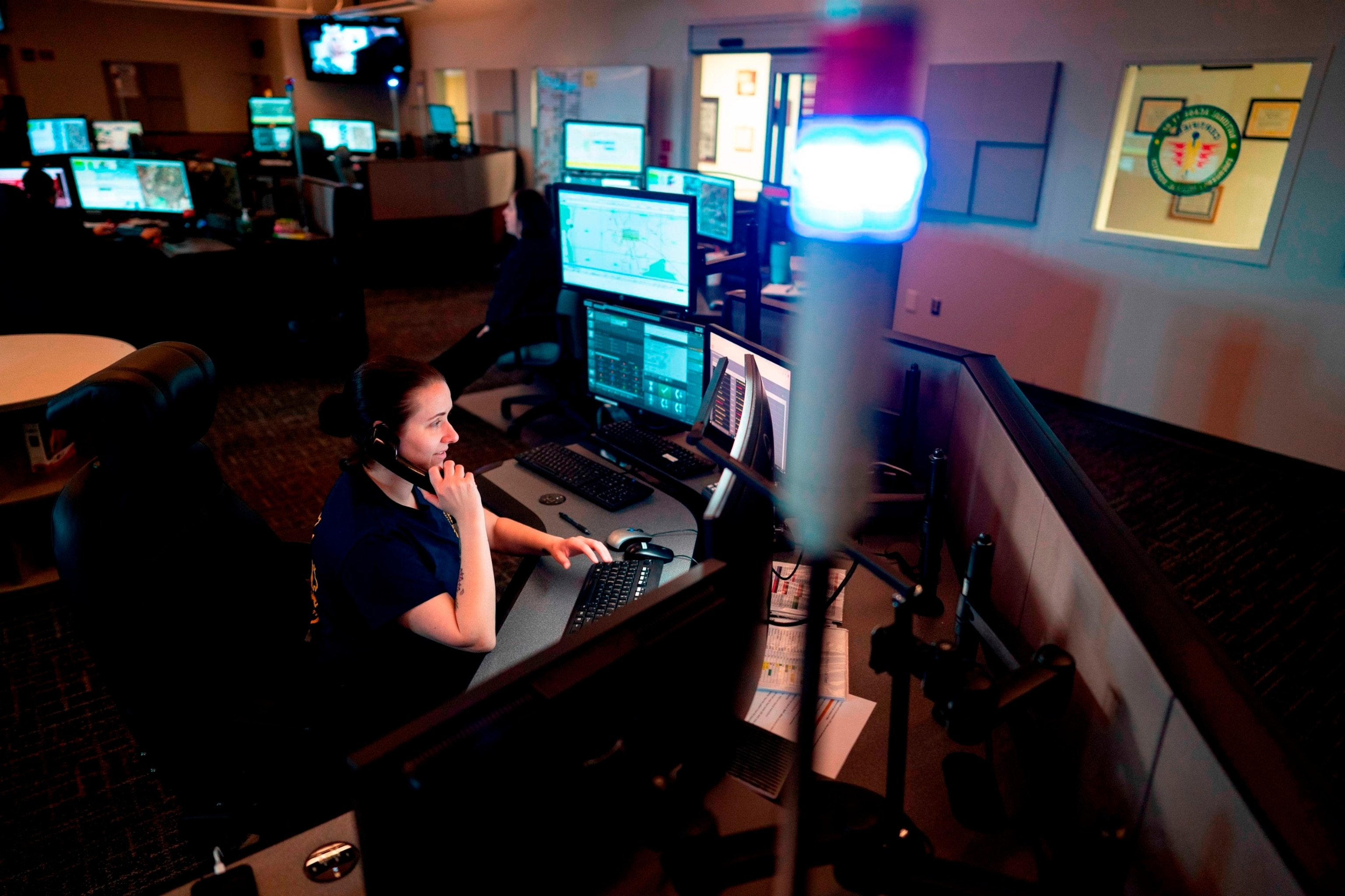 PHOTO: A dispatcher with Anne Arundel County Fire Department answers a 911 emergency call from their department dispatch center, April 14, 2020, in Glen Burnie, Md.