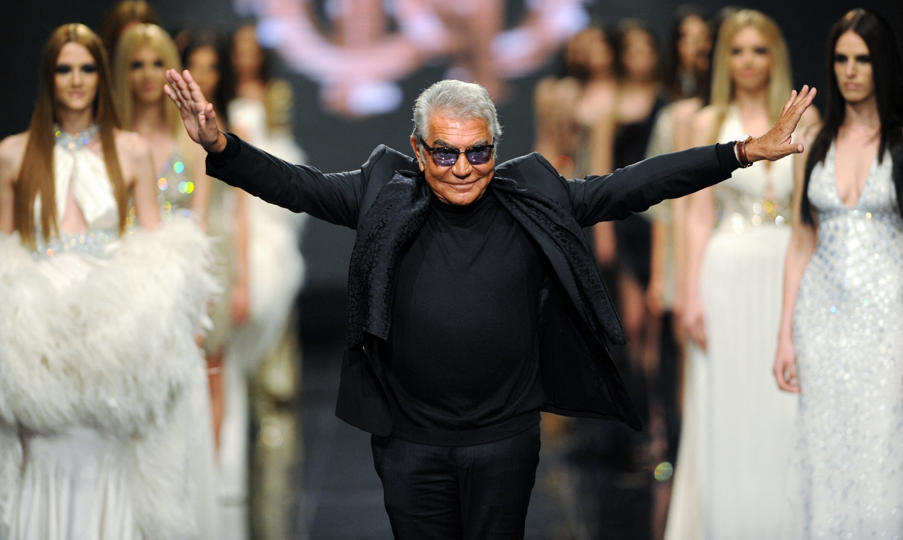 PHOTO: Italian fashion designer Roberto Cavalli attends his fashion show on late evening, June 10, 2013, in the Montenegrin coastal town of Budva. 