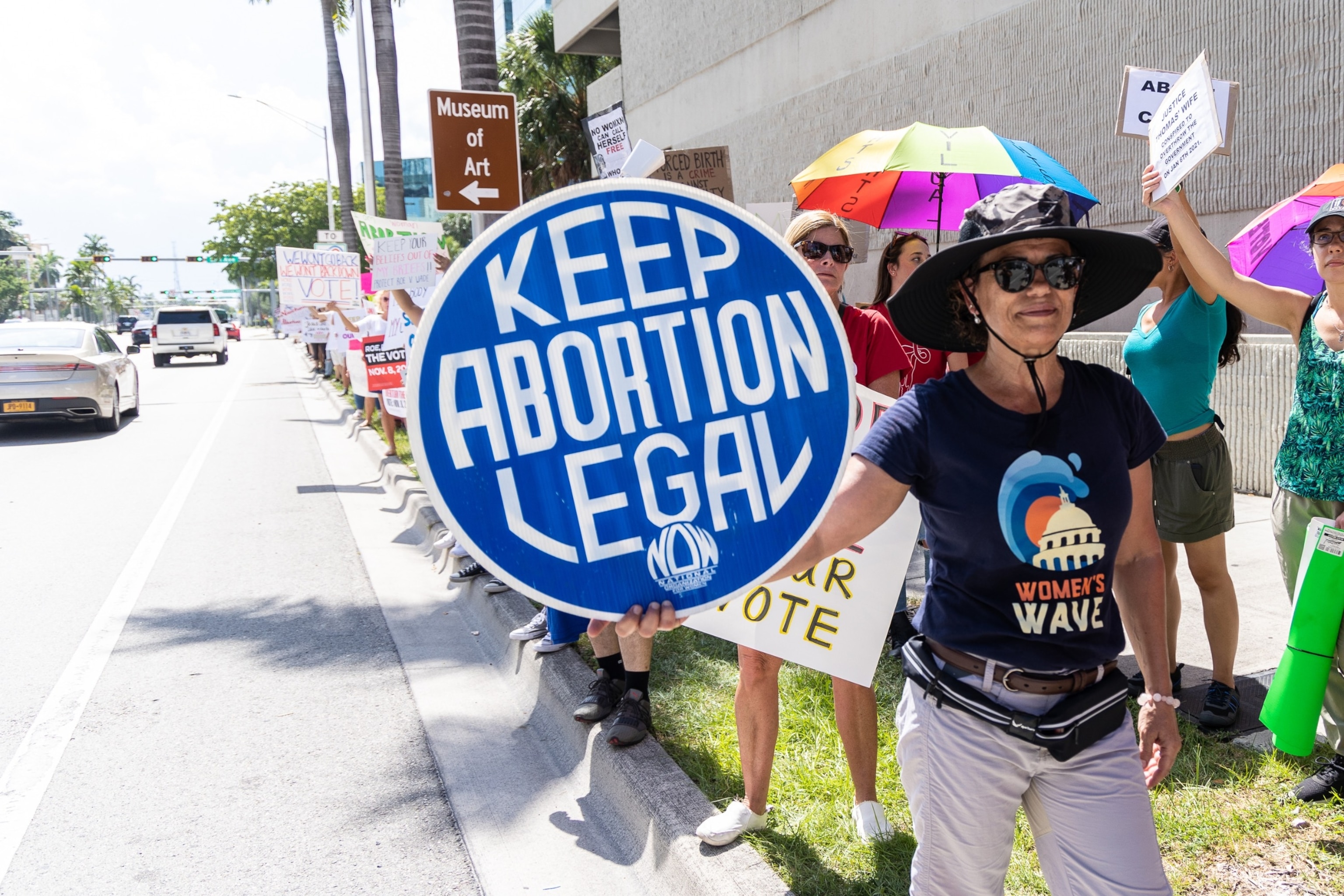 PHOTO: An abortion rights activist holds a sign at a protest in support of abortion access, March To Roe The Vote And Send A Message To Florida Politicians That Abortion Access Must Be Protected And Defended, July 13, 2022, in Fort Lauderdale, Fla.