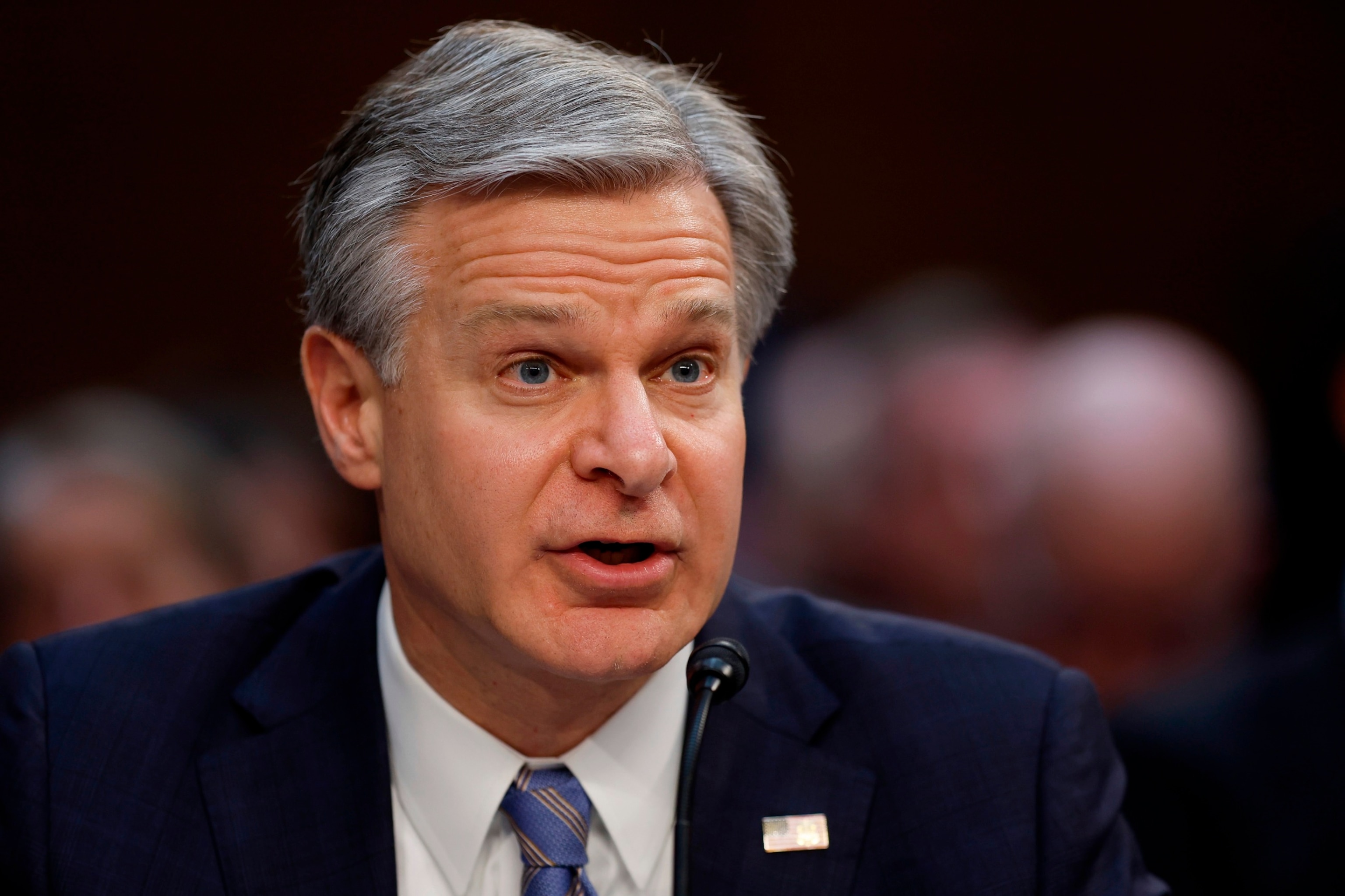 PHOTO: Federal Bureau of Investigation Director Christopher Wray testifies before the Senate Select Committee on Intelligence about global threats against the United States in the Hart Senate Office Building on Capitol Hill, March 11, 2024.