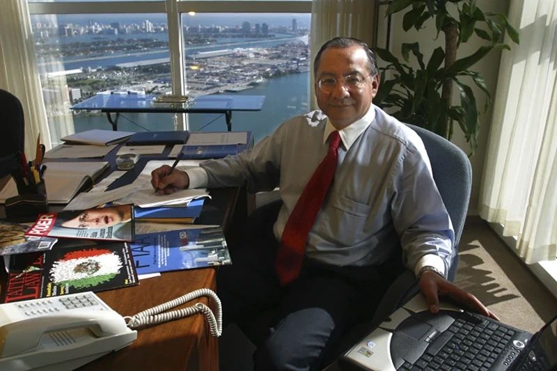 3 of 5 | FILE - Manuel Rocha sits in his office at Steel Hector & Davis in Miami in January 2003, joining the firm to help open doors in Latin America. On Thursday, Feb. 29, 2024, Rocha, 73, told a judge he would admit to federal counts of conspiring to act as an agent of a foreign government, charges that could land him behind bars for several years. (Raul Rubiera/Miami Herald via AP, File)