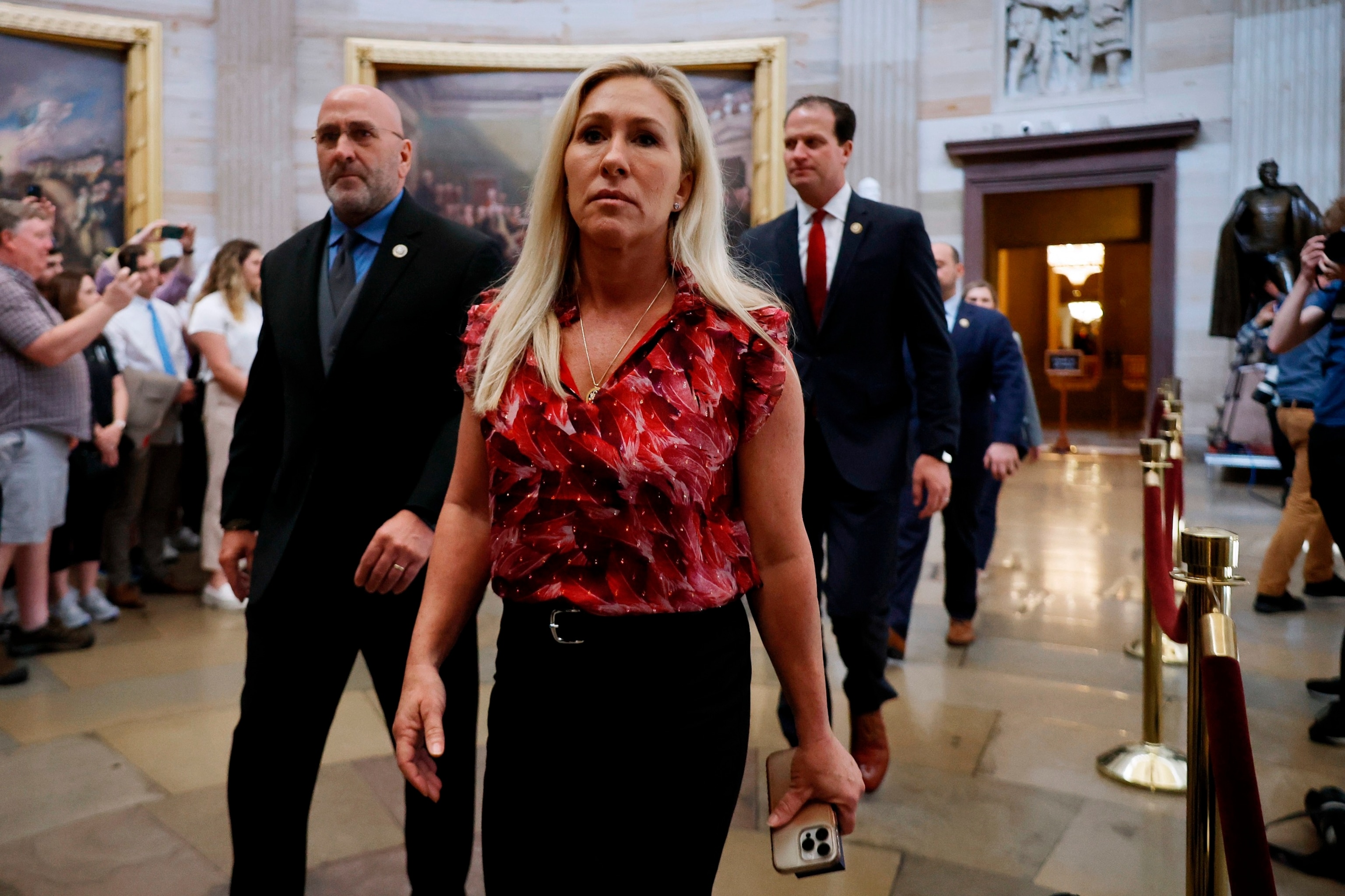 PHOTO: House Homeland Security Committee member Rep. Marjorie Taylor Greene and her fellow Republican impeachment managers walk back through the Capitol Rotunda, April 16, 2024.