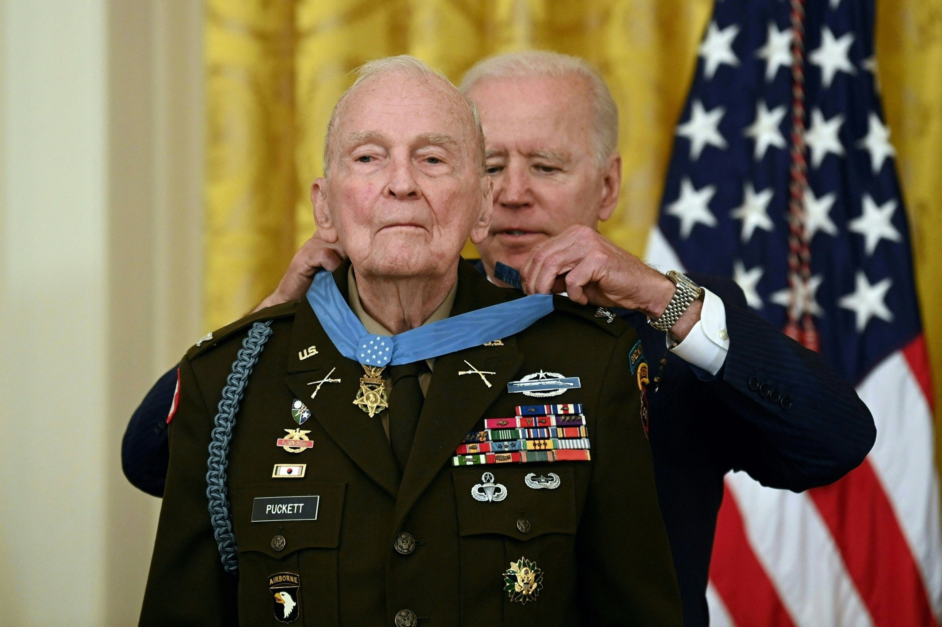 PHOTO: President Joe Biden presents the Medal of Honor to 94-year-old retired Army colonel Ralph Puckett, Jr., for conspicuous gallantry while serving during the Korean War, in a ceremony in the East Room of the White House in Washington, May 21, 2021. 