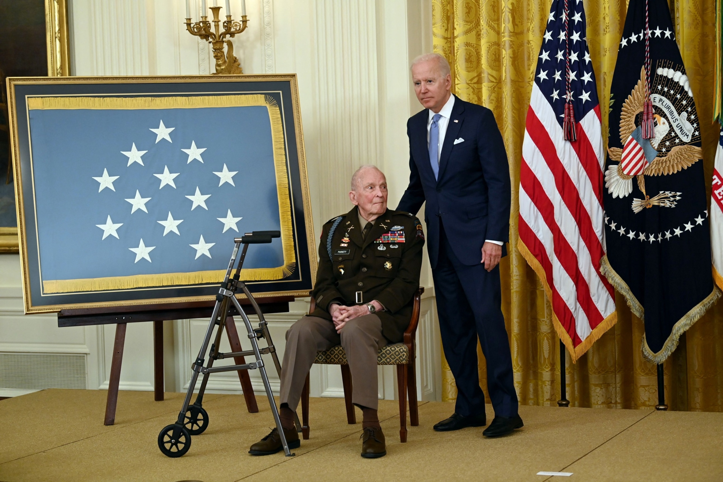 PHOTO: President Joe Biden stands next to 94-year-old retired Army colonel Ralph Puckett, Jr., before presenting him with the Medal of Honor for conspicuous gallantry while serving during the Korean War, in Washington, DC on May 21, 2021.