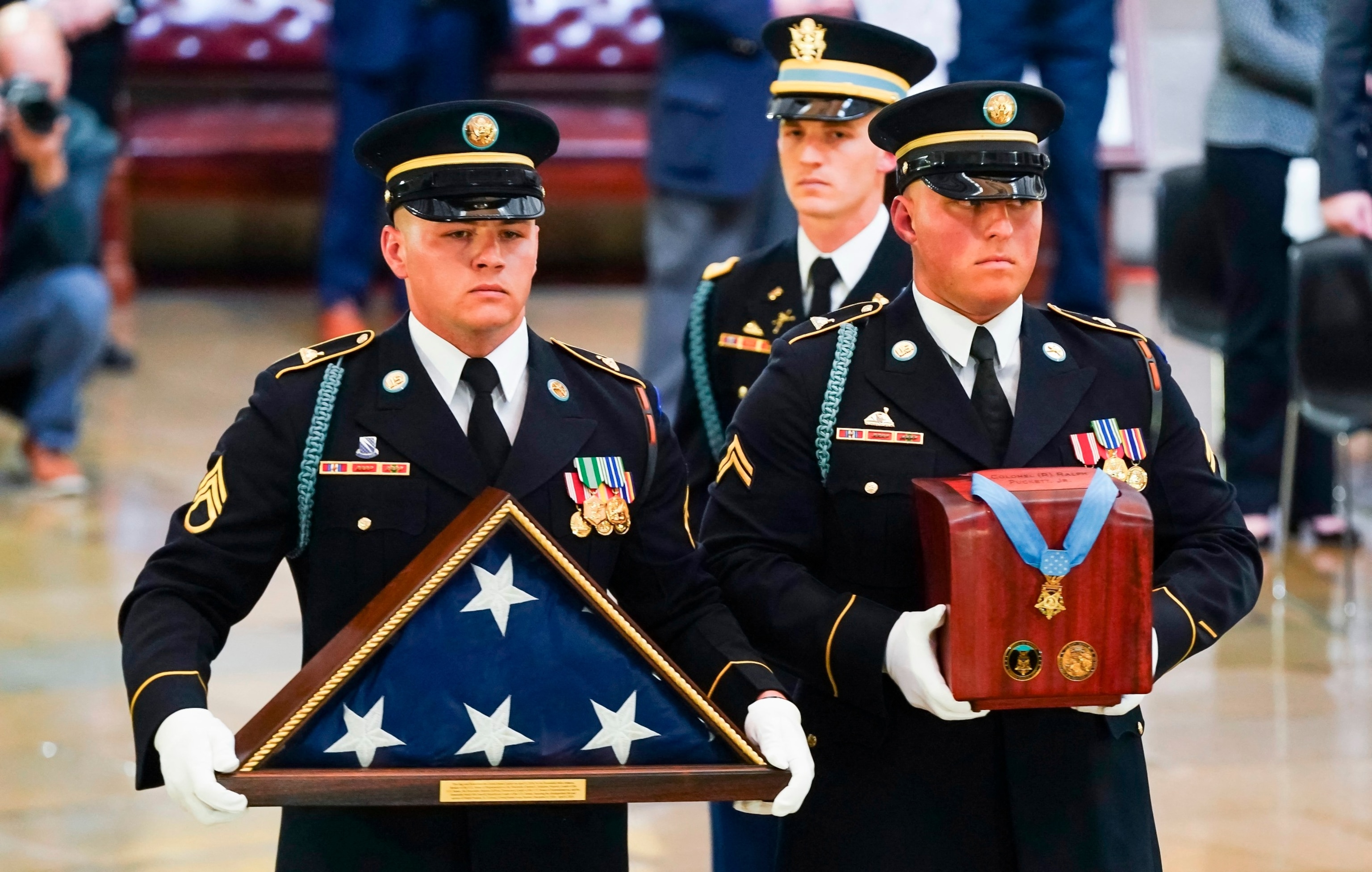 PHOTO: An honor guard carries an urn containing the cremated remains of the late Army Col. Ralph Puckett during a memorial ceremony in the rotunda of the US Capitol on April 29, 2024, in Washington, DC.