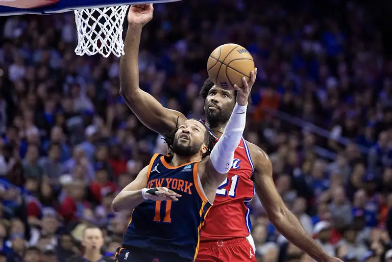 New York Knicks guard Jalen Brunson (11) drives against Philadelphia 76ers center Joel Embiid (21) during the second half of game four of the first round in the 2024 NBA playoffs at Wells Fargo Center. Mandatory Credit: Bill Streicher-USA TODAY Sports