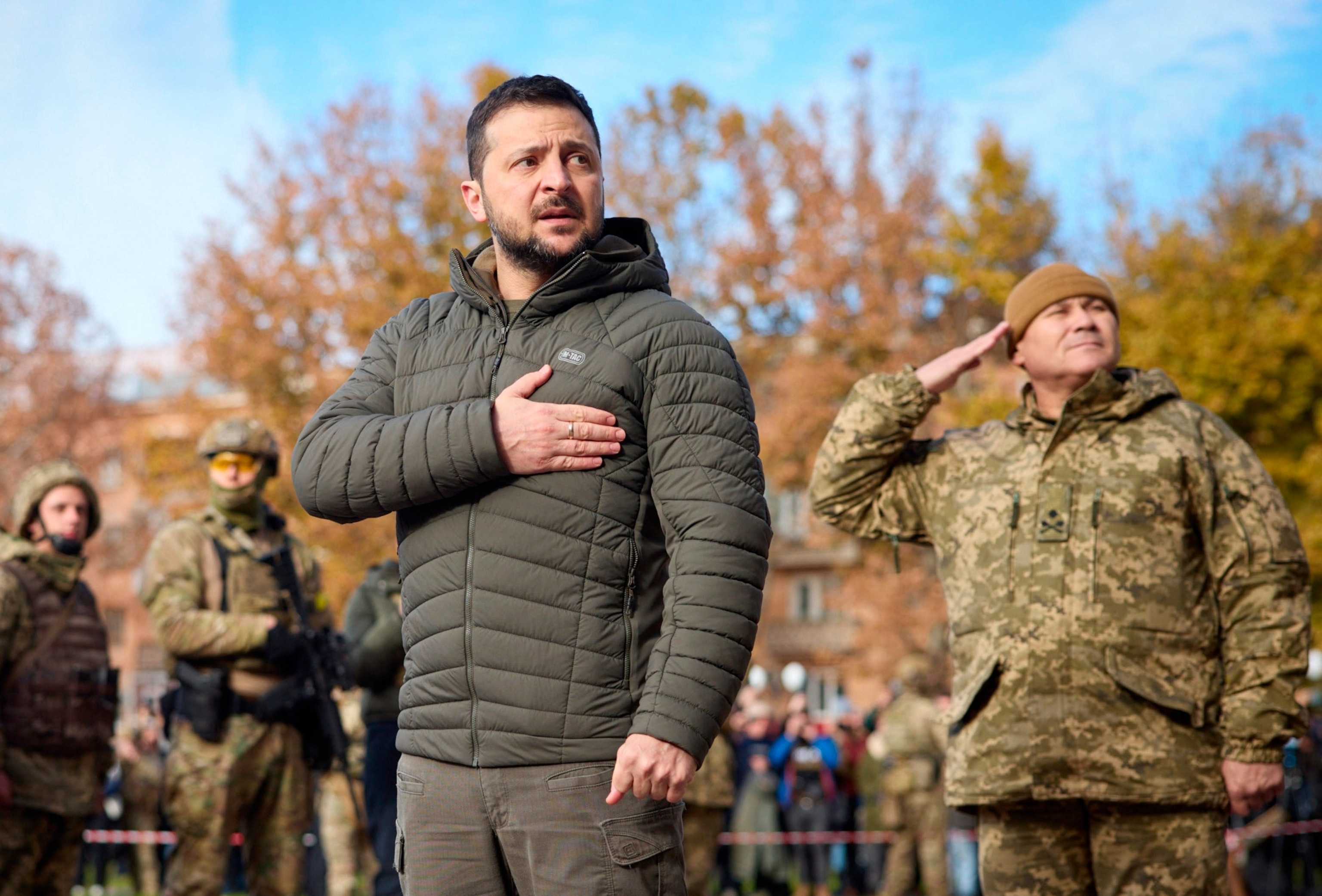 PHOTO: In this photo provided by the Ukrainian Presidential Press Office, Ukrainian President Volodymyr Zelenskyy listens to the national anthem during his visit to Kherson, Ukraine, Nov. 14, 2022.