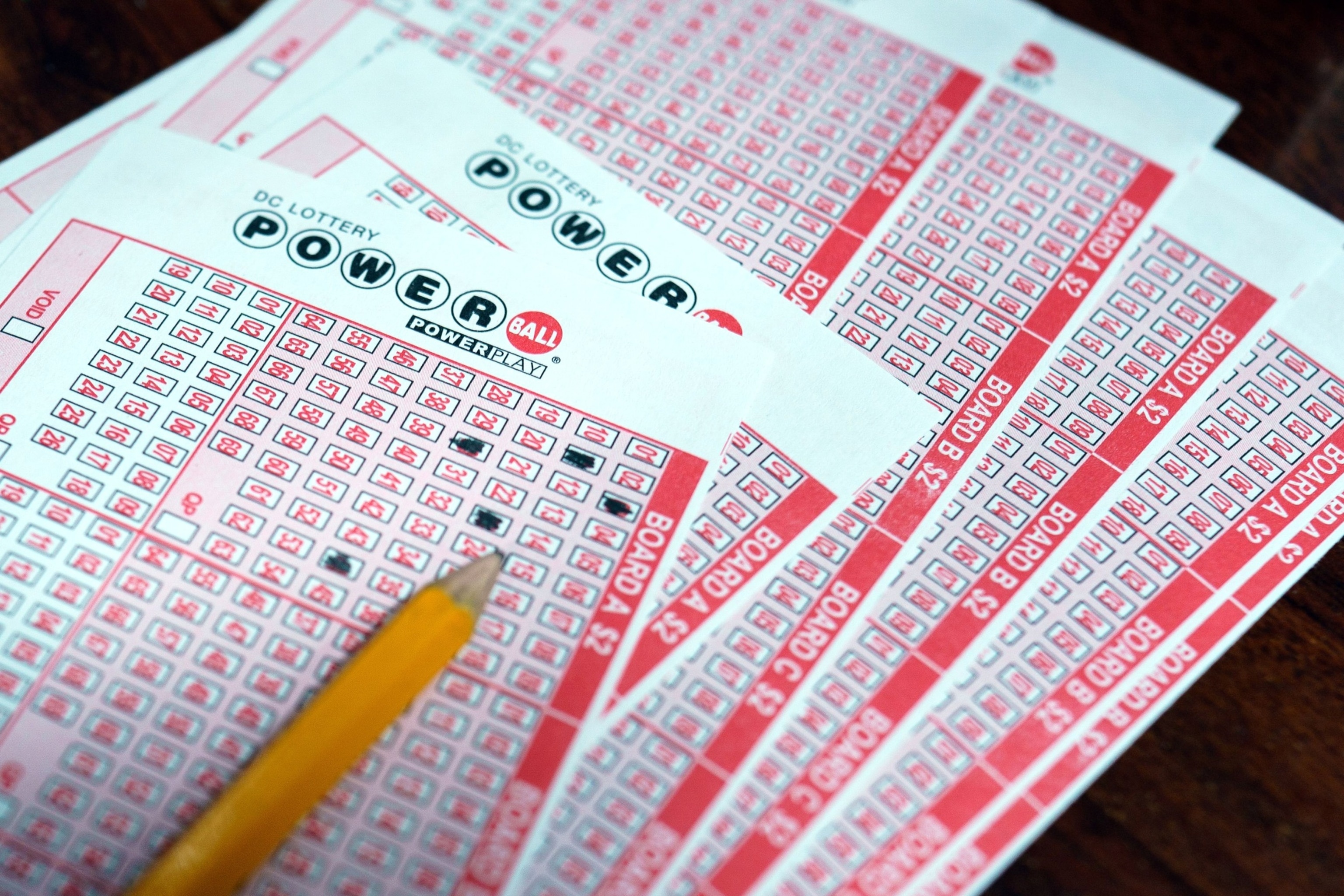 PHOTO: A Powerball multi-state lottery ticket is shown at a retailer in Washington, D.C., April 2, 2024. 