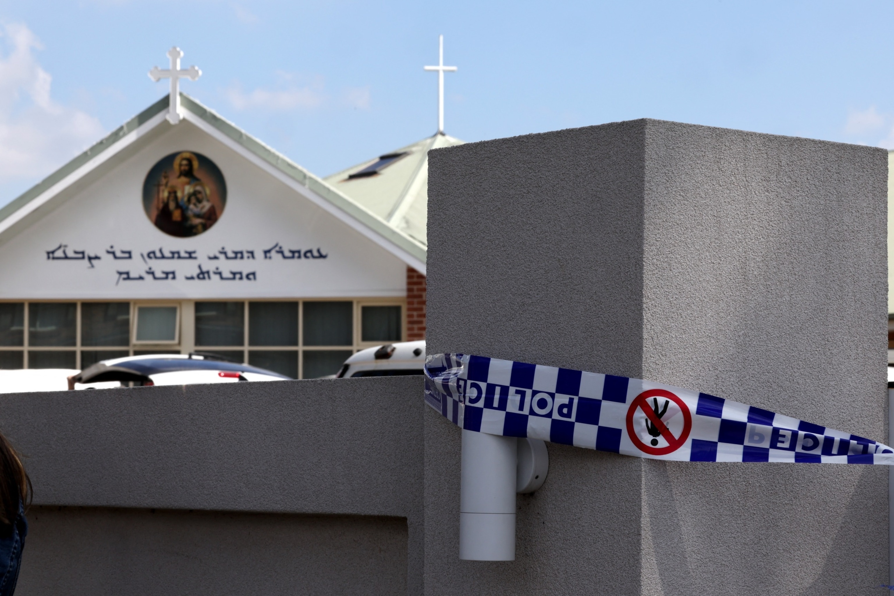 PHOTO: Police tape covers the main gate of the Christ the Good Shepherd Church in Sydney's western suburb of Wakeley on April 16, 2024. 