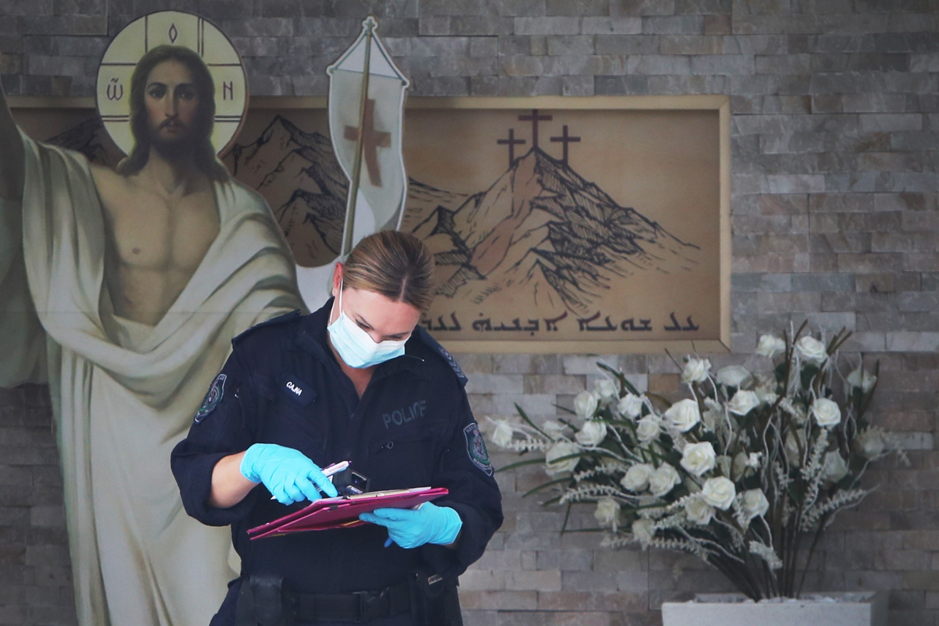 PHOTO: A member of NSW Forensic police is seen at Christ The Good Shepherd Church in the suburb of Wakeley on April 16, 2024 in Sydney, Australia. 