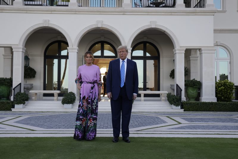 PALM BEACH, FLORIDA - APRIL 06: Republican presidential candidate, former US President Donald Trump and former first lady Melania Trump arrive at the home of billionaire investor John Paulson on April 6, 2024 in Palm Beach, Florida. Donald Trump's campaign is expecting to raise more than 40 million dollars when major donors gather a fundraiser billed as the "Inaugural Leadership Dinner". (Photo by Alon Skuy/Getty Images)