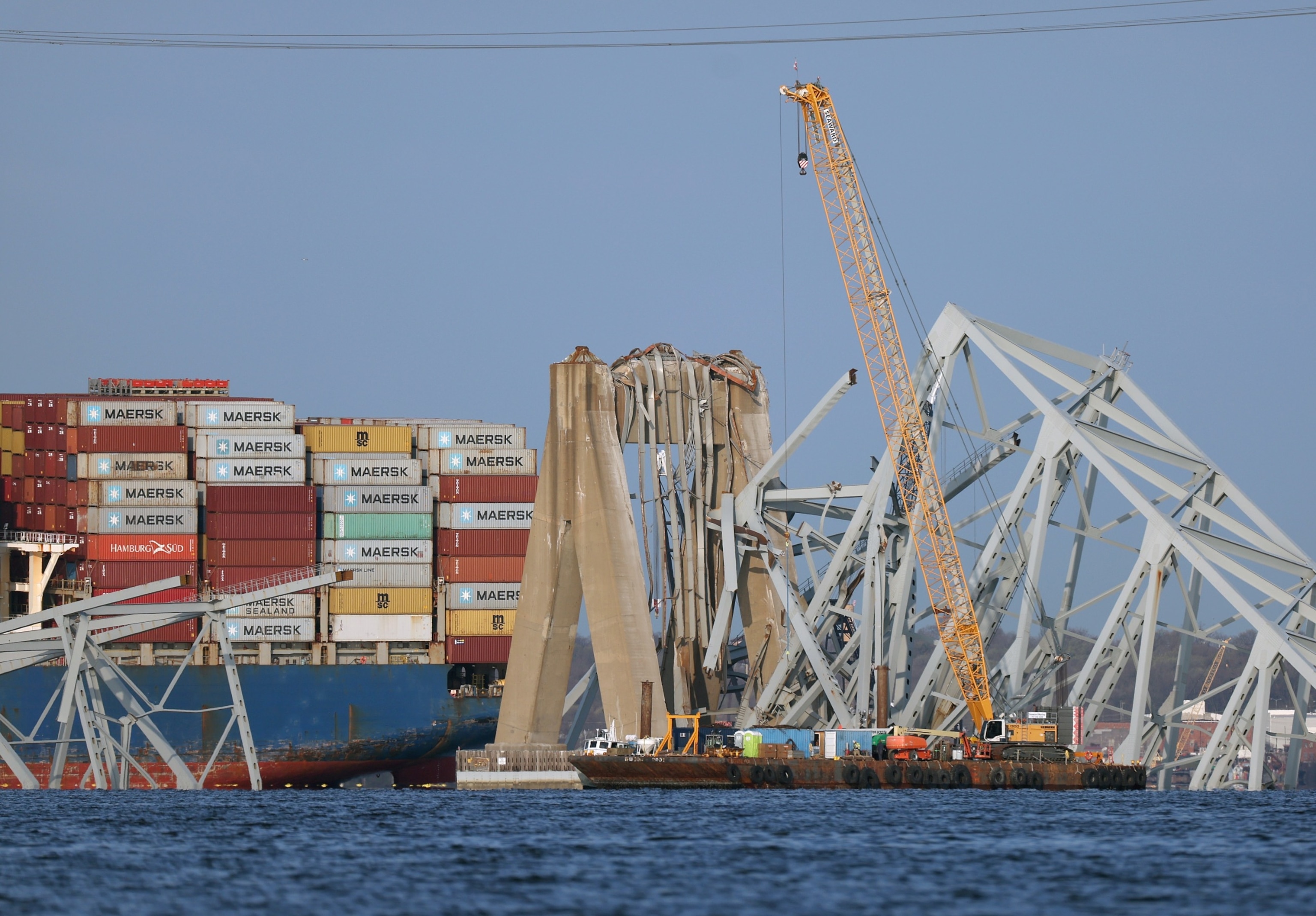 PHOTO: A crane works on the debris of the Francis Scott Key Bridge on March 29, 2024 in Baltimore.