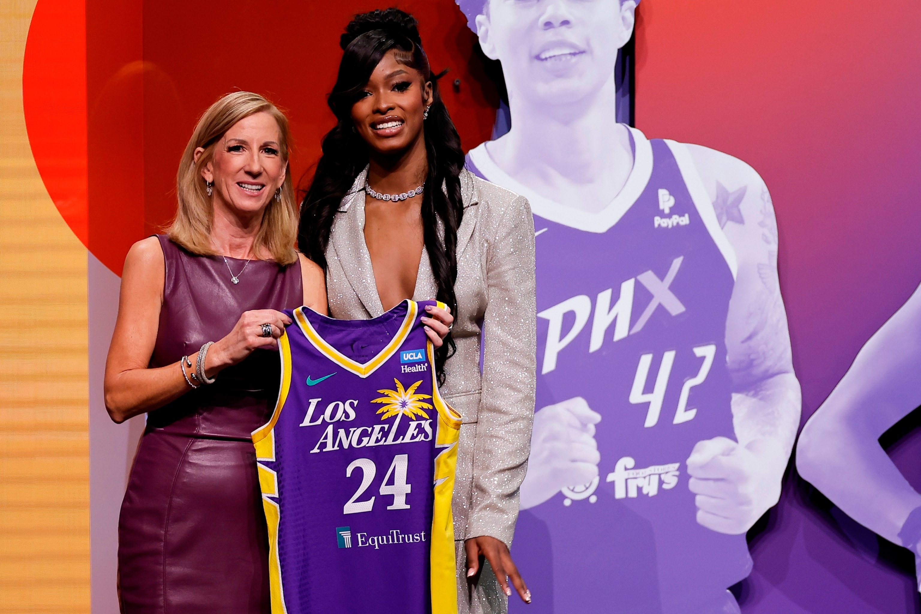 PHOTO: Tennessee's Rickea Jackson, right, poses for a photo with WNBA commissioner Cathy Engelbert after being selected fourth overall by the Los Angeles Sparks during the first round of the WNBA basketball draft, April 15, 2024, in New York. 