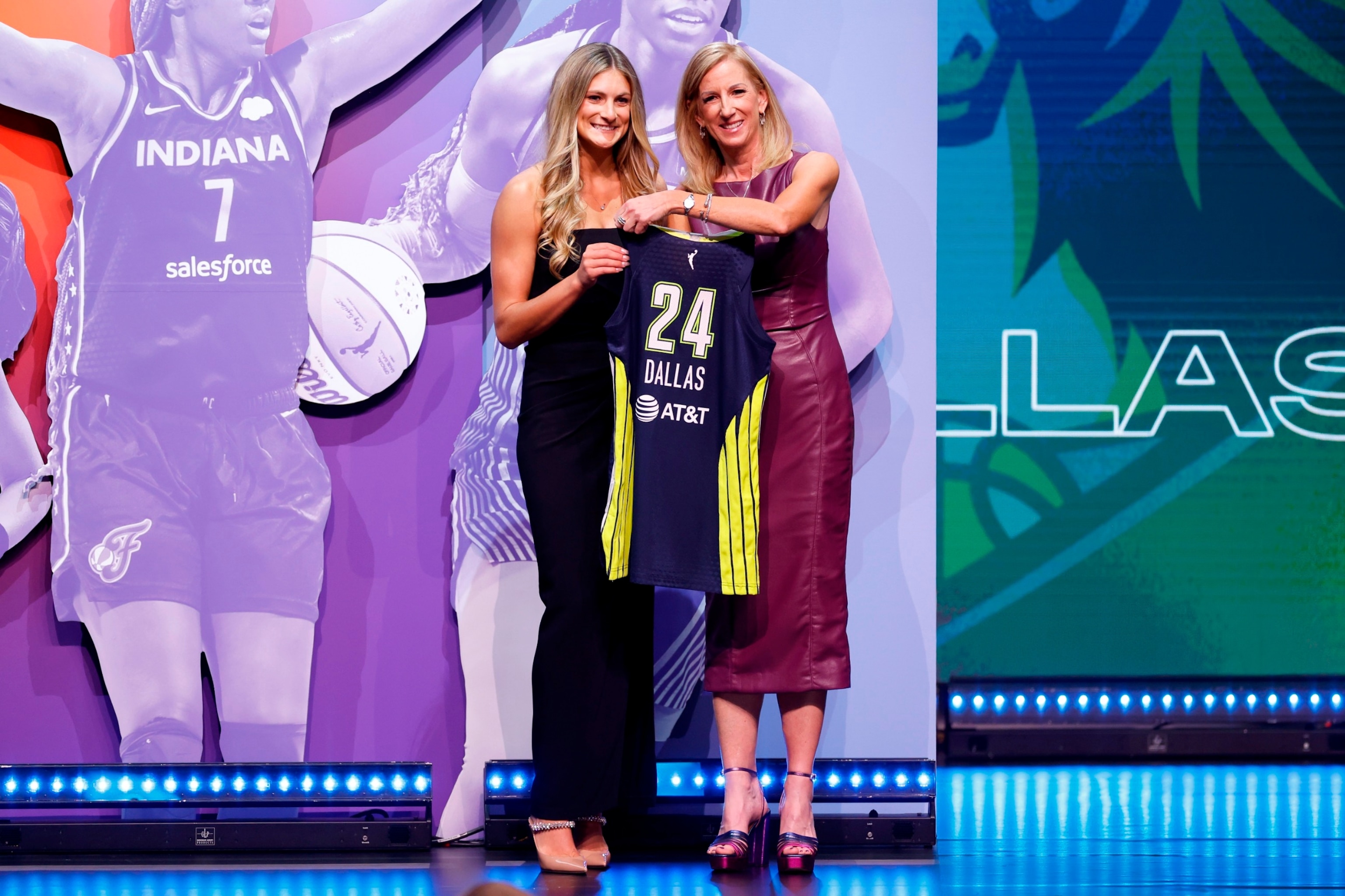 PHOTO: Jacy Sheldon poses with WNBA Commissioner Cathy Engelbert after being selected fifth overall pick by the Dallas Wings during the 2024 WNBA Draft at Brooklyn Academy of Music on April 15, 2024 in New York City. 