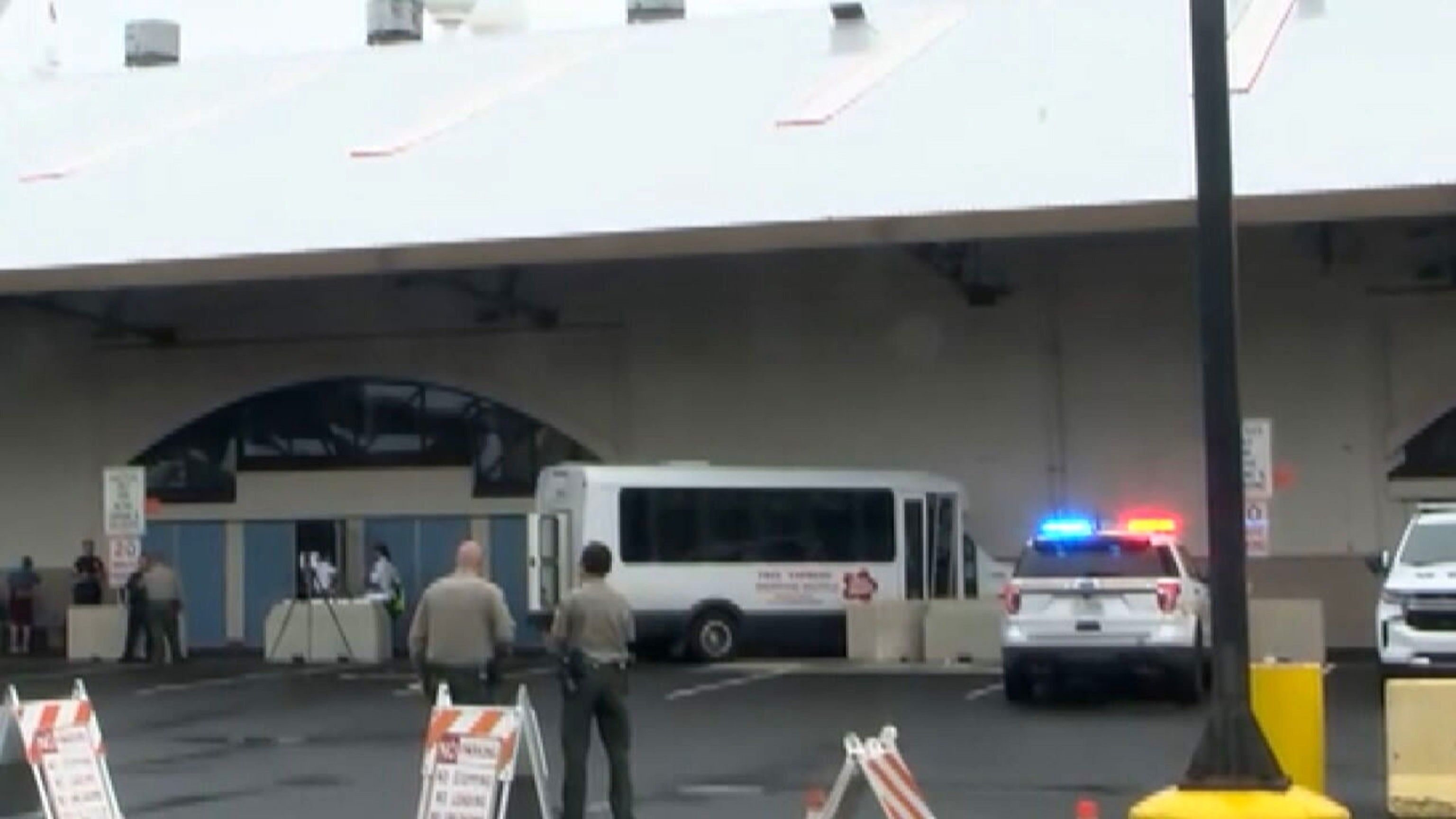 PHOTO: In this screen grab from a video, law enforcement officials are shown at the scene where nine Carnival Miracle guests were hit by a shuttle bus in the transportation area, in Honolulu, Hawaii, on April 12, 2024.