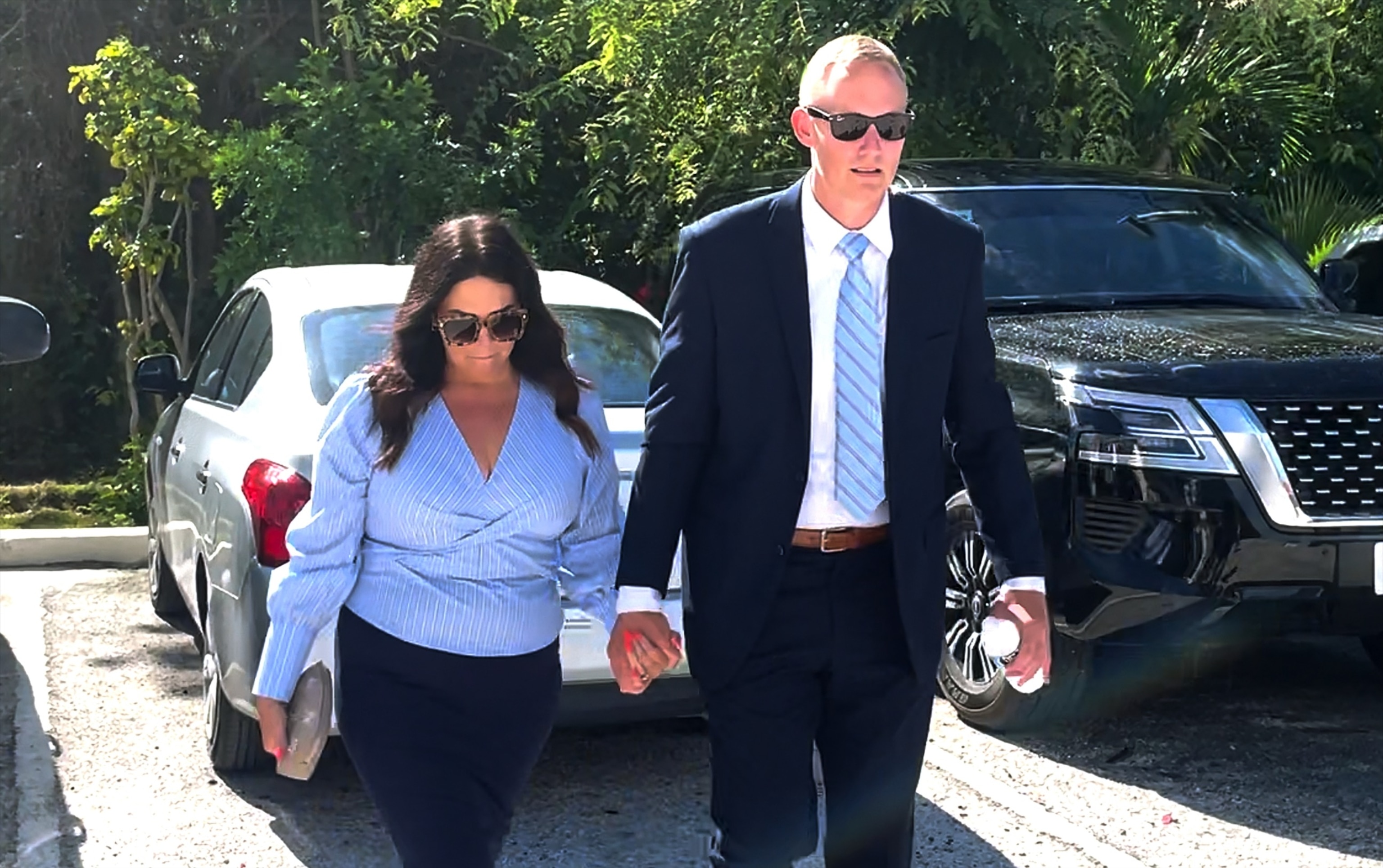 PHOTO: Bryan Hagerich with his wife Ashley, arrives at court in Turks and Caicos for sentencing.
