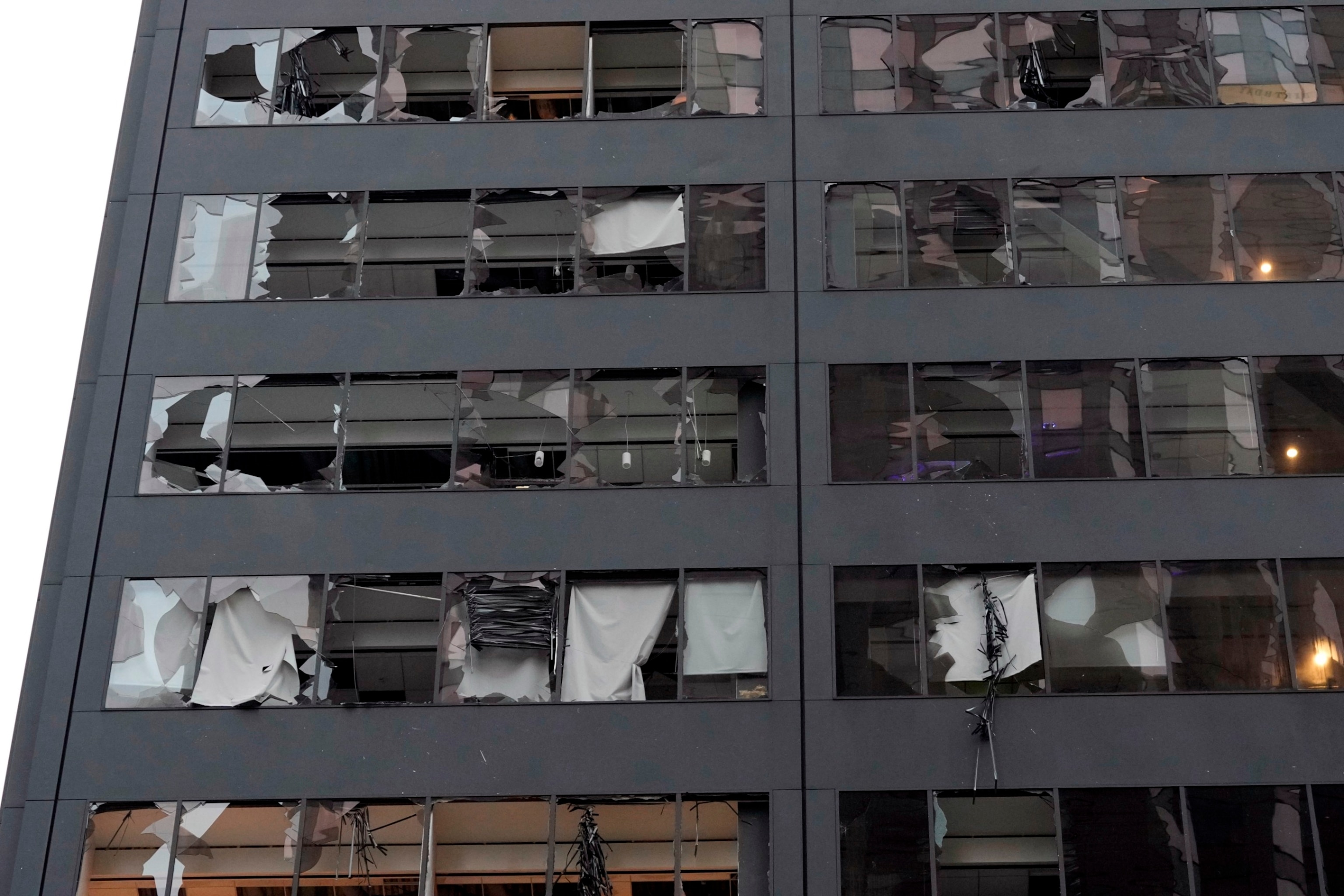PHOTO: Blown out windows of a downtown high-rise building are shown in the aftermath of a severe thunderstorm May 17, 2024, in Houston. 