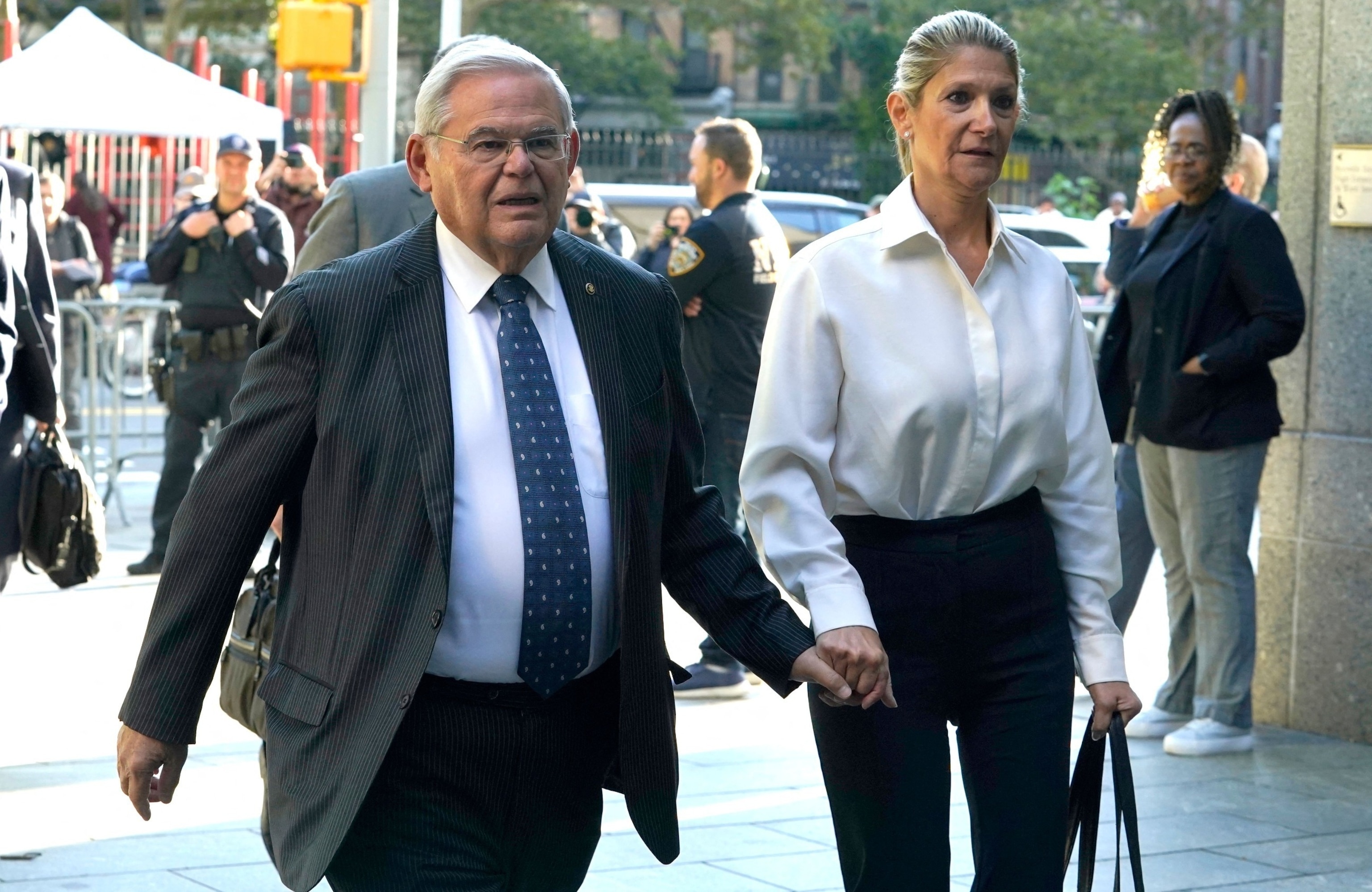 PHOTO: Senator Bob Menendez, Democrat of New Jersey, and his wife Nadine Arslanian, arrive at the US District Court, Southern District of New York, in New York City on Sept. 27, 2023. 