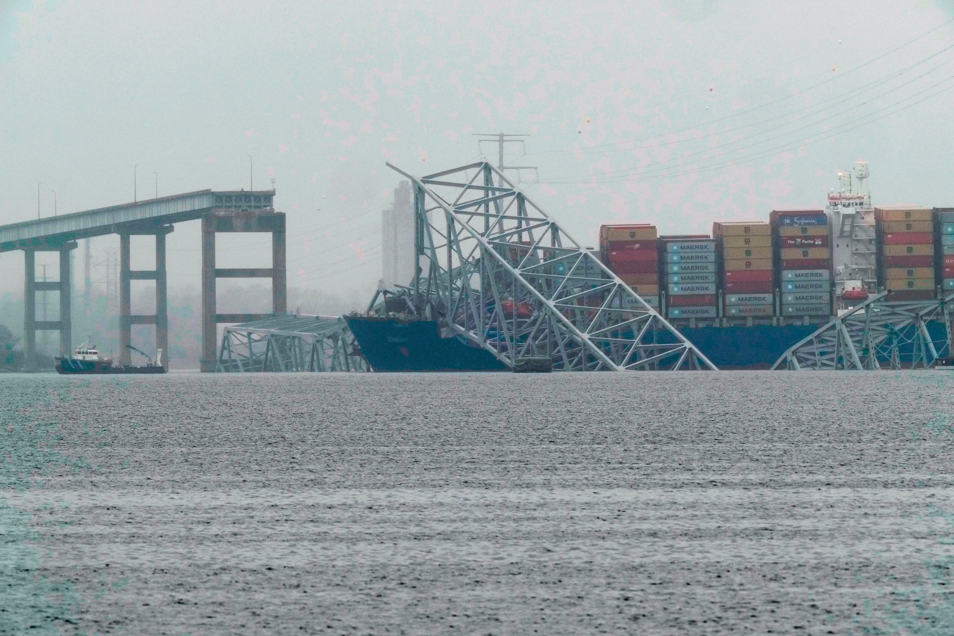 PHOTO: A container ship rests against the wreckage of the Francis Scott Key Bridge Mar. 28, 2024, in Baltimore.