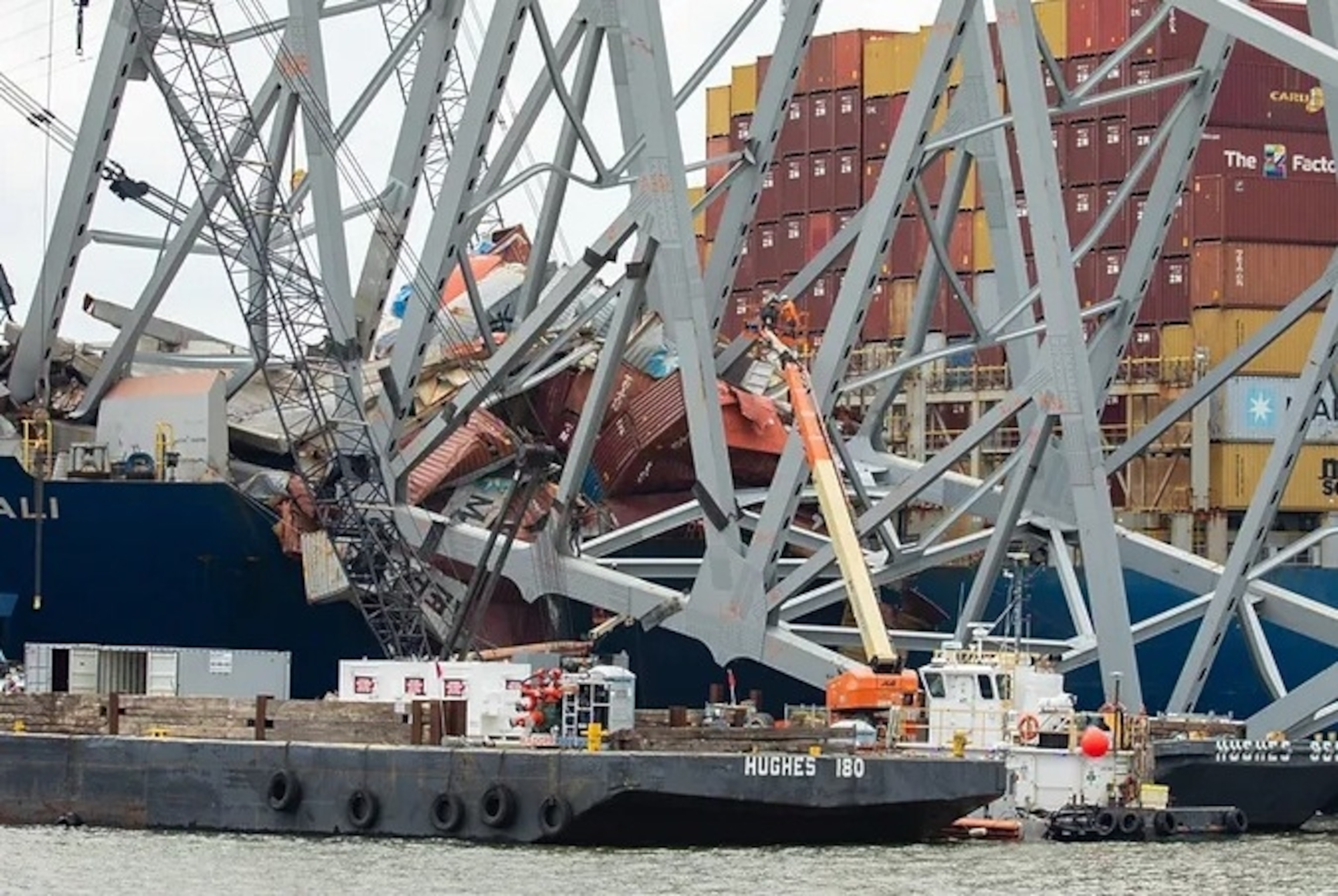 PHOTO: Salvors with the Unified Command prepare charges for upcoming precision cuts to remove section 4 from the port side of the bow of the M/V DALI, May 7, 2024, during the Key Bridge Response 2024.