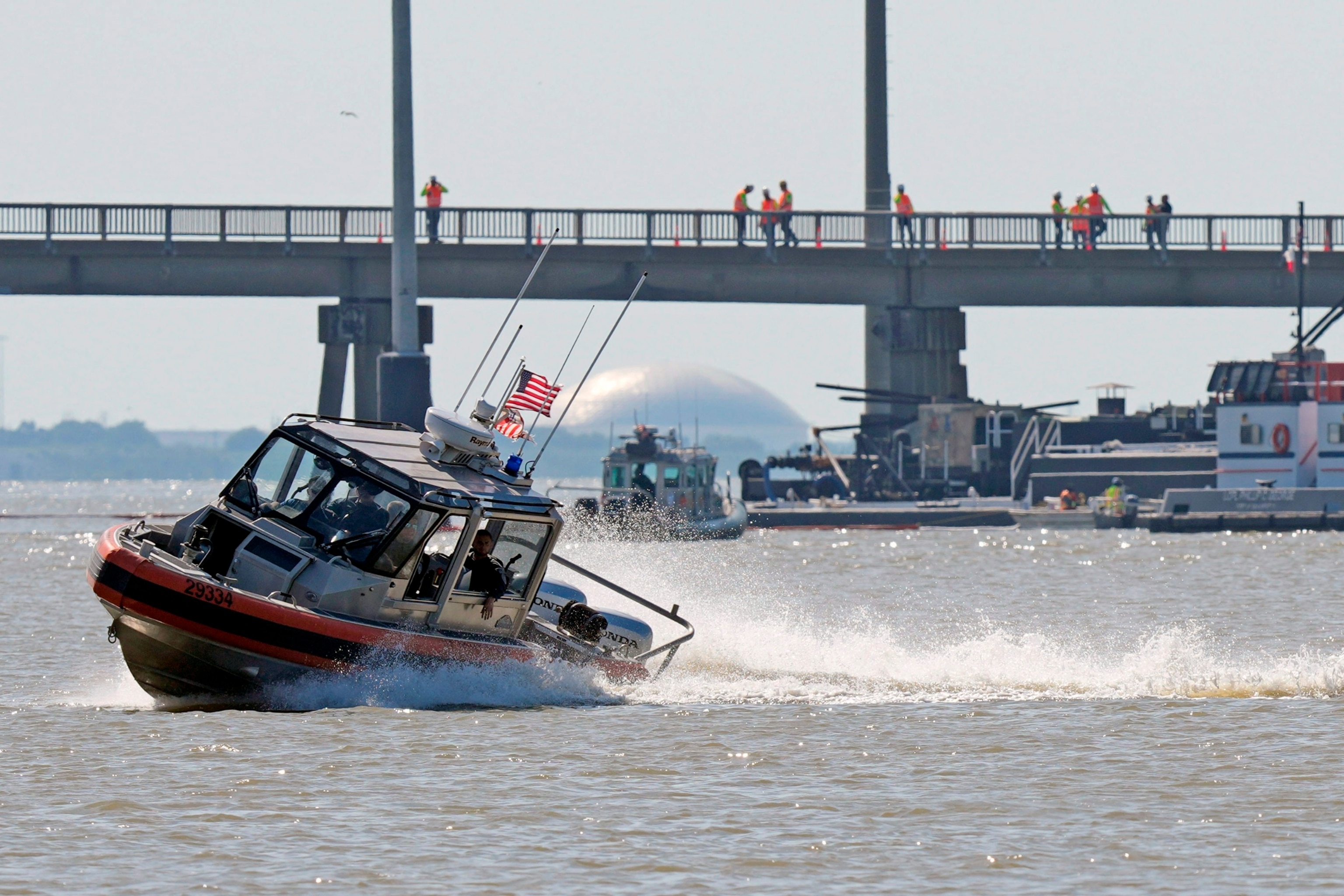 PHOTO: A U.S. Coast Guard boat patrols the waters near the site where a barge hit the Pelican Island Bridge, May 15, 2024, in Galveston, Texas.