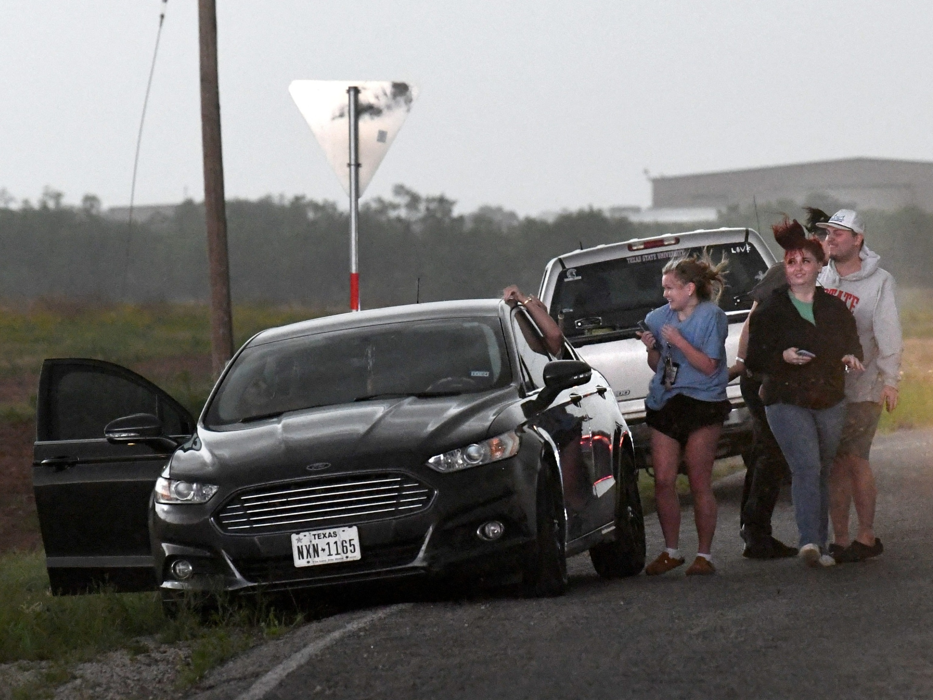 PHOTO: People watch the progression of a storm that brought a tornado between Abilene and Hawley