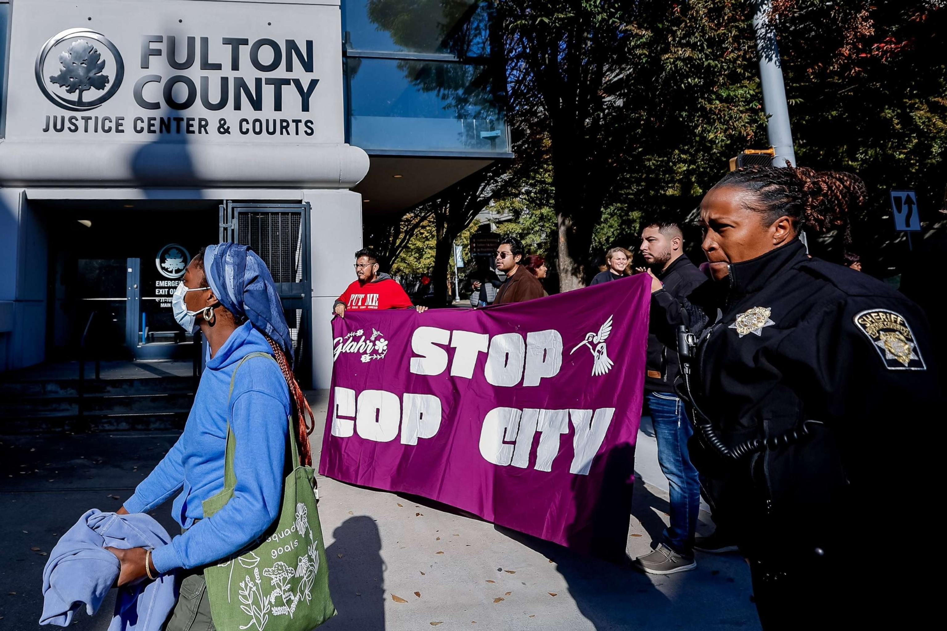 PHOTO: In this Nov. 6, 2023, file photo, "Stop Cop City" demonstrators protest outside the Fulton County Courthouse as 61 fellow protesters are arraigned on state RICO (Racketeer Influenced and Corrupt Organizations) charges in Atlanta.