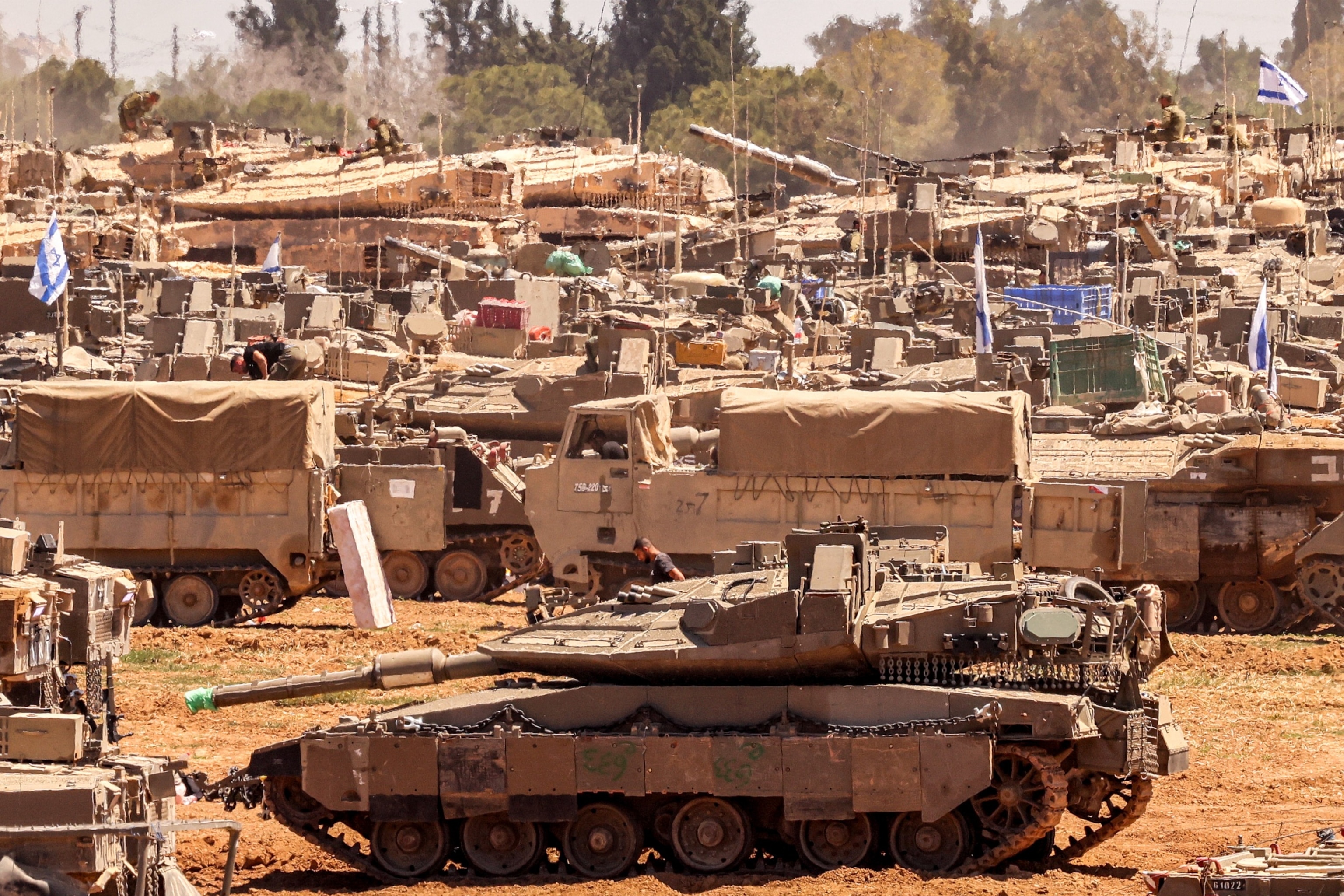 PHOTO: Israeli military vehicles are seen near the Israel-Gaza border, amid the ongoing conflict between Israel and the Palestinian Islamist group Hamas, in southern Israel, May 8, 2024. 