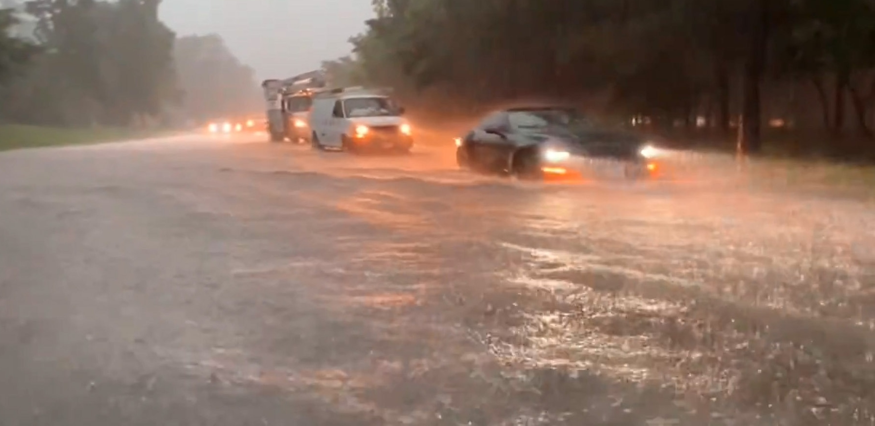 PHOTO: In this screen grab taken from a video that was posted to social media, cars drive through flood waters in the Houston, Texas, area on May 2, 2024.