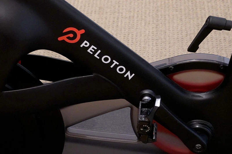 CORAL GABLES, FLORIDA - JANUARY 20: A Peloton bike on the showroom floor on January 20, 2022 in Coral Gables, Florida. Reports indicate that Peloton Interactive Inc is temporarily halting production of its bikes and treadmills after a drop in demand for the products. (Photo by Joe Raedle/Getty Images)