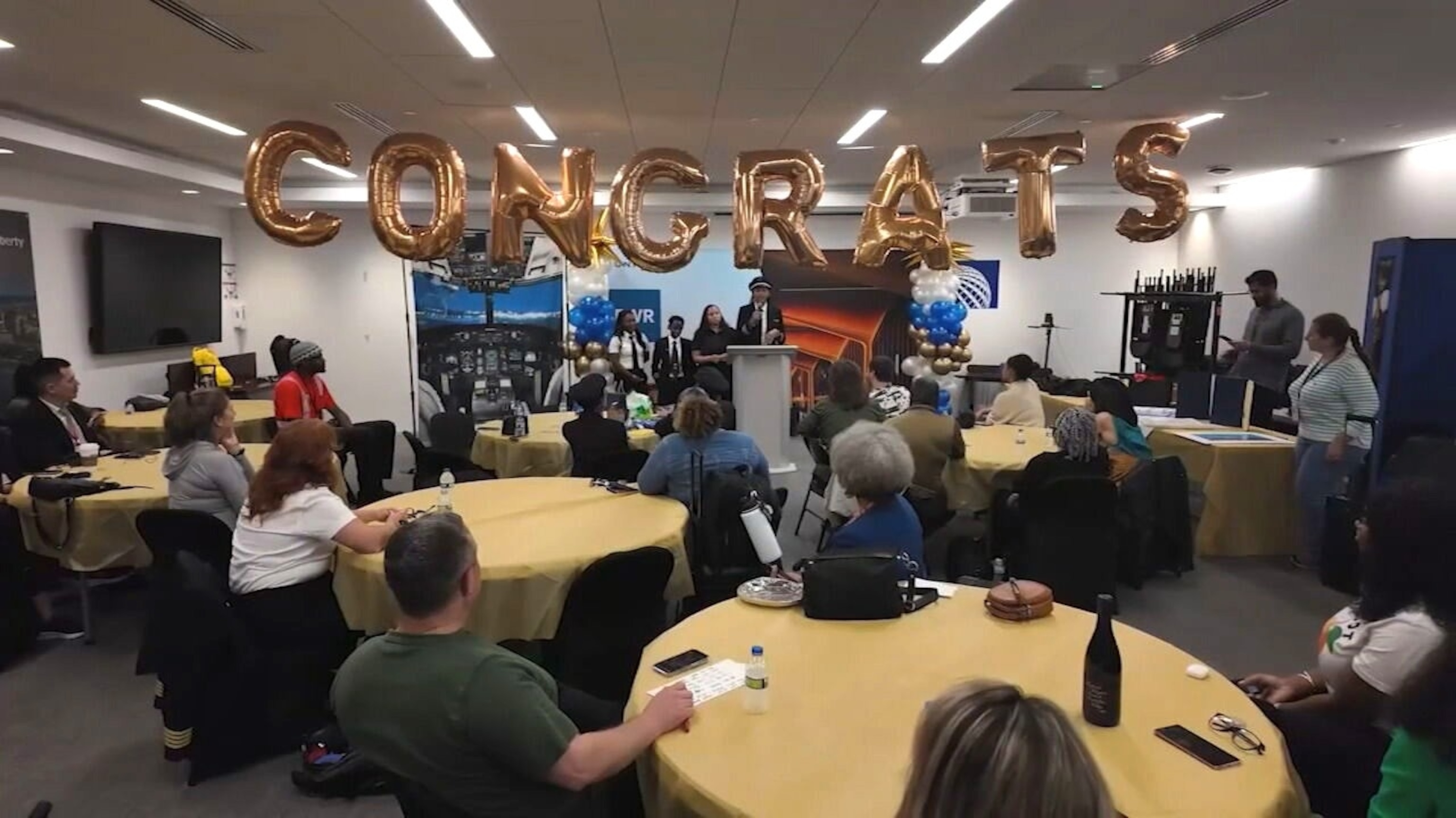 PHOTO: In this screen grab from a video, the retirement party for United Airlines pilot Theresa Claiborne is shown.