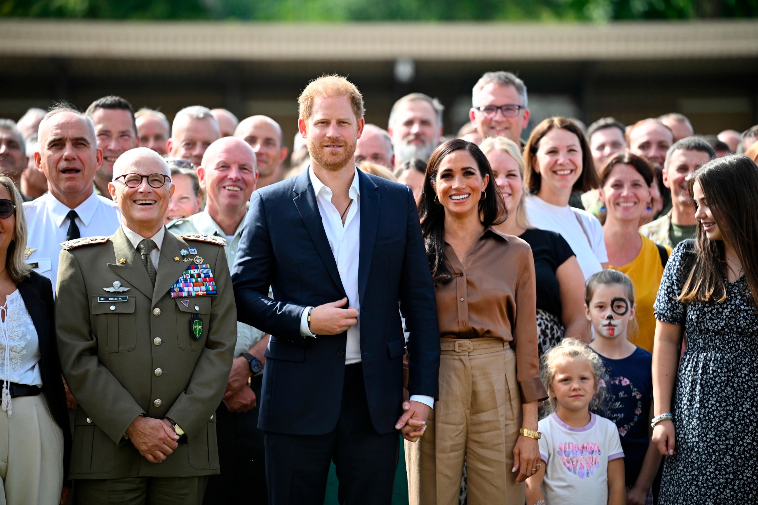 PHOTO: Prince Harry, Duke of Sussex and Meghan, Duchess of Sussex meet with NATO Joint Force Command and families from Italy and Netherlands during day five of the Invictus Games Dusseldorf 2023, Sept. 14, 2023, in Duesseldorf, Germany. 