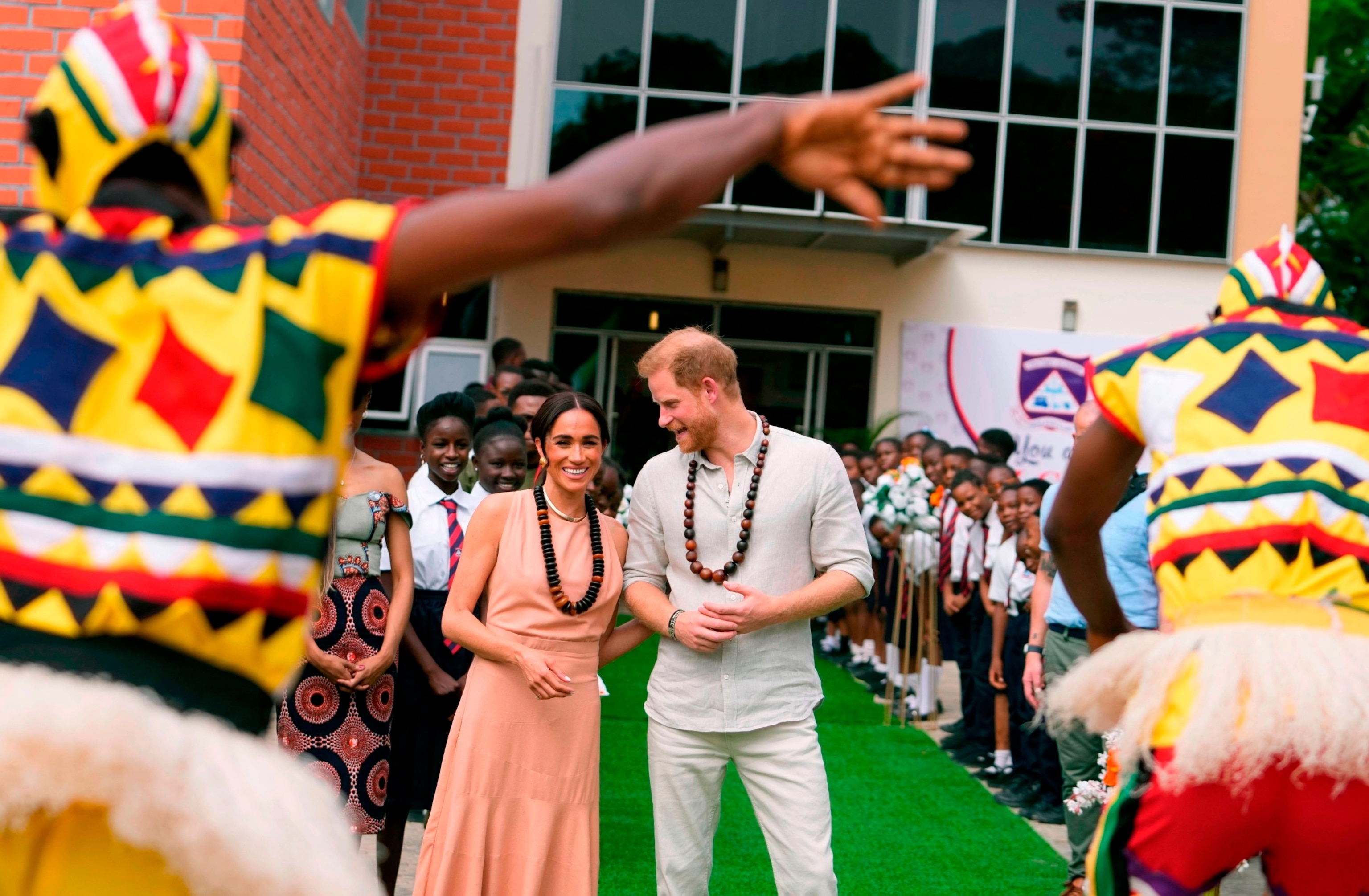 PHOTO: Prince Harry and Meghan visit children at the Lights Academy in Abuja, Nigeria, May 10, 2024.