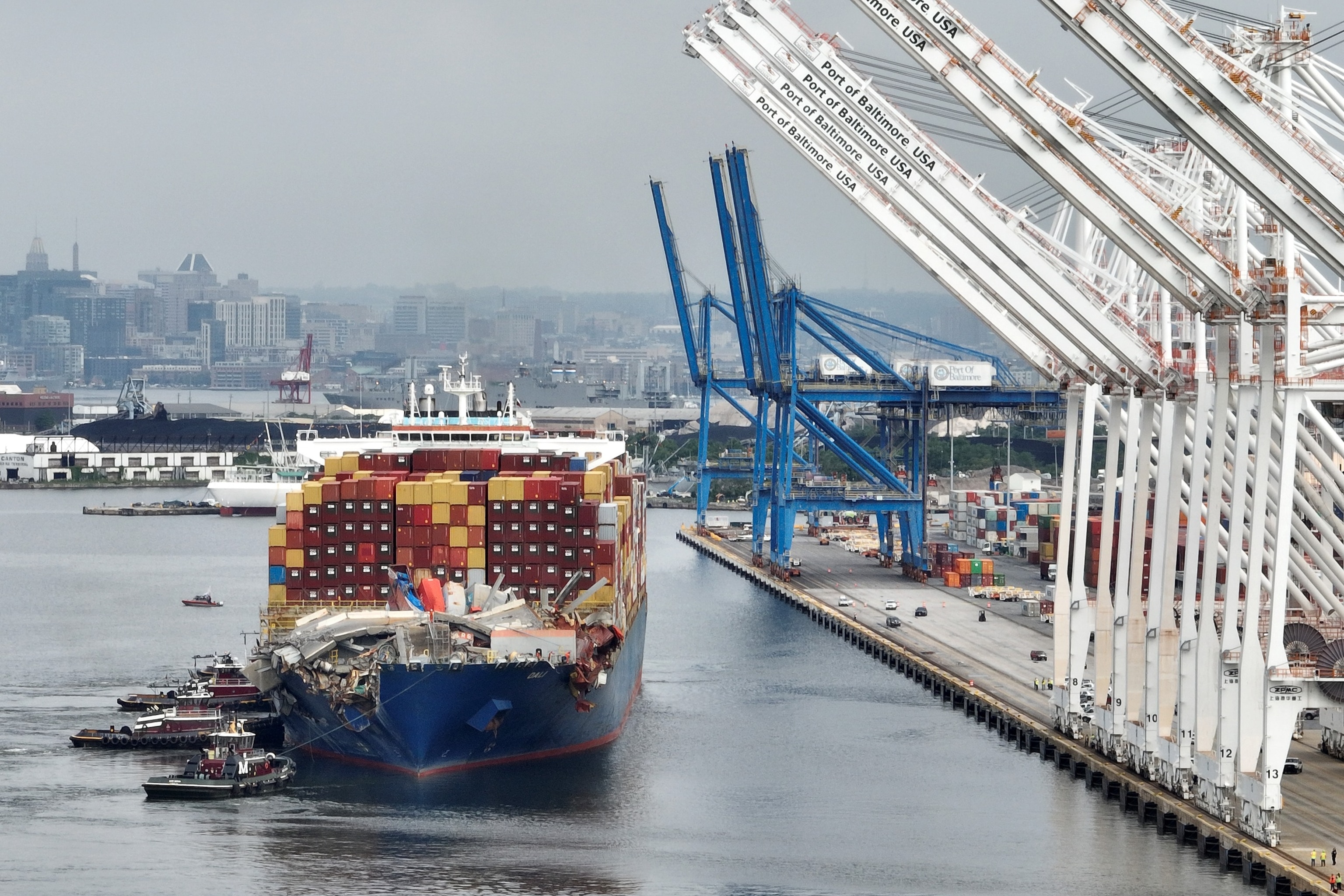 PHOTO: The damaged container ship Dali is maneuvered into the Seagirt Marine Terminal, May 20, 2024, in Baltimore, Md. 