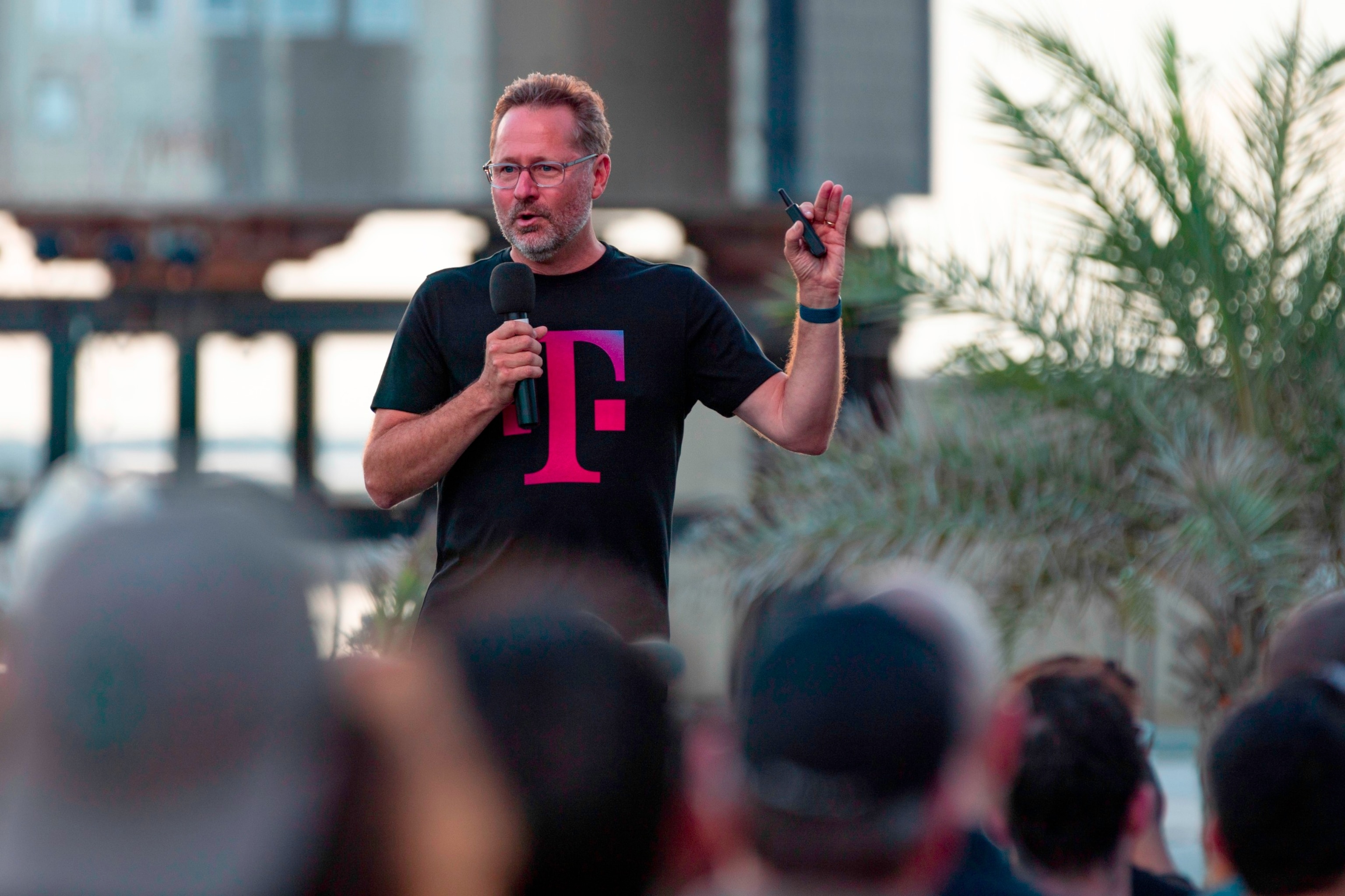 PHOTO: T-Mobile CEO Mike Sievert speaks during a T-Mobile and SpaceX joint event, Aug. 25, 2022, in Boca Chica Beach, Texas. 