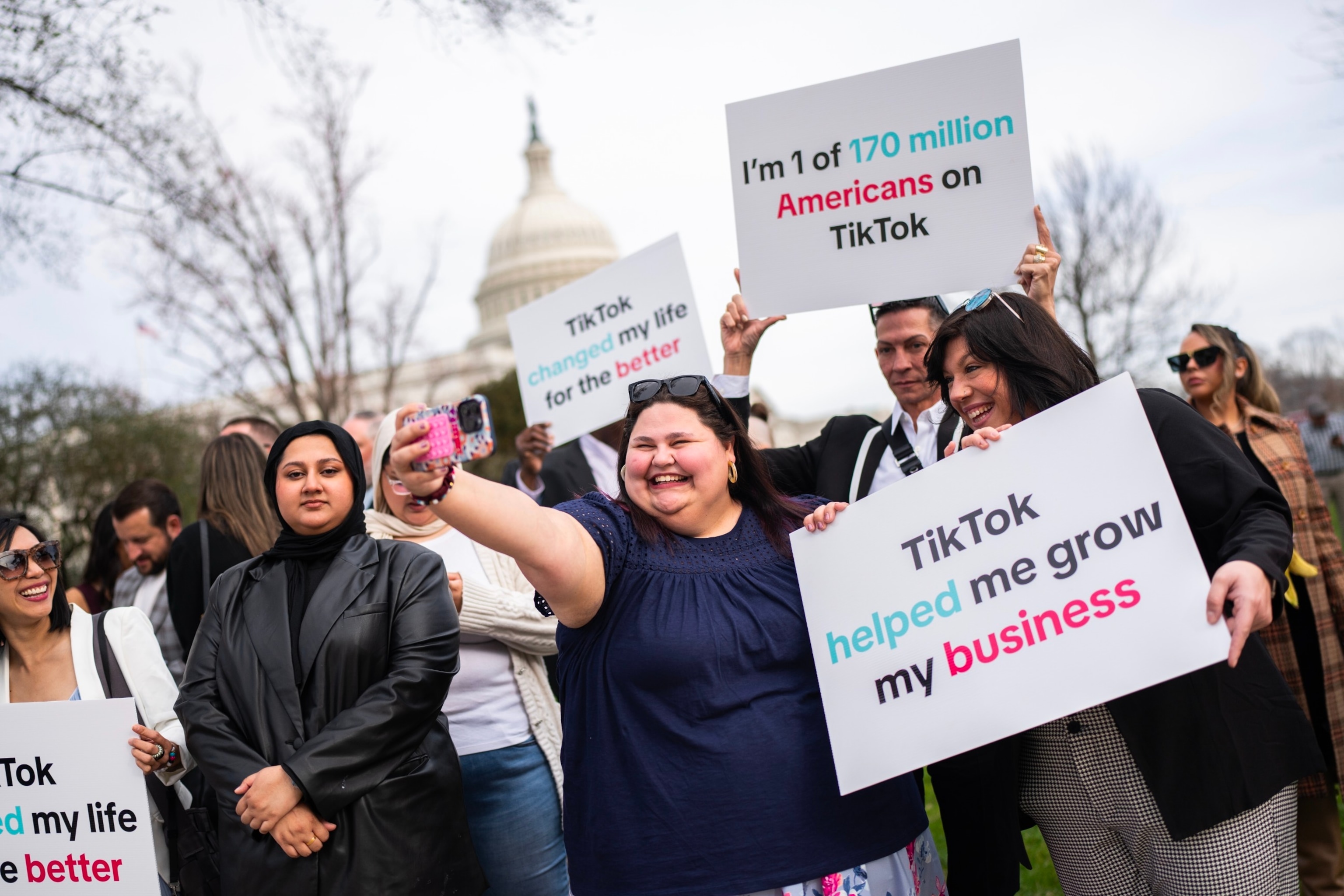 PHOTO: Tik Tok supporters are seen outside the U.S. Capitol, March 13, 2024, in Washington. 