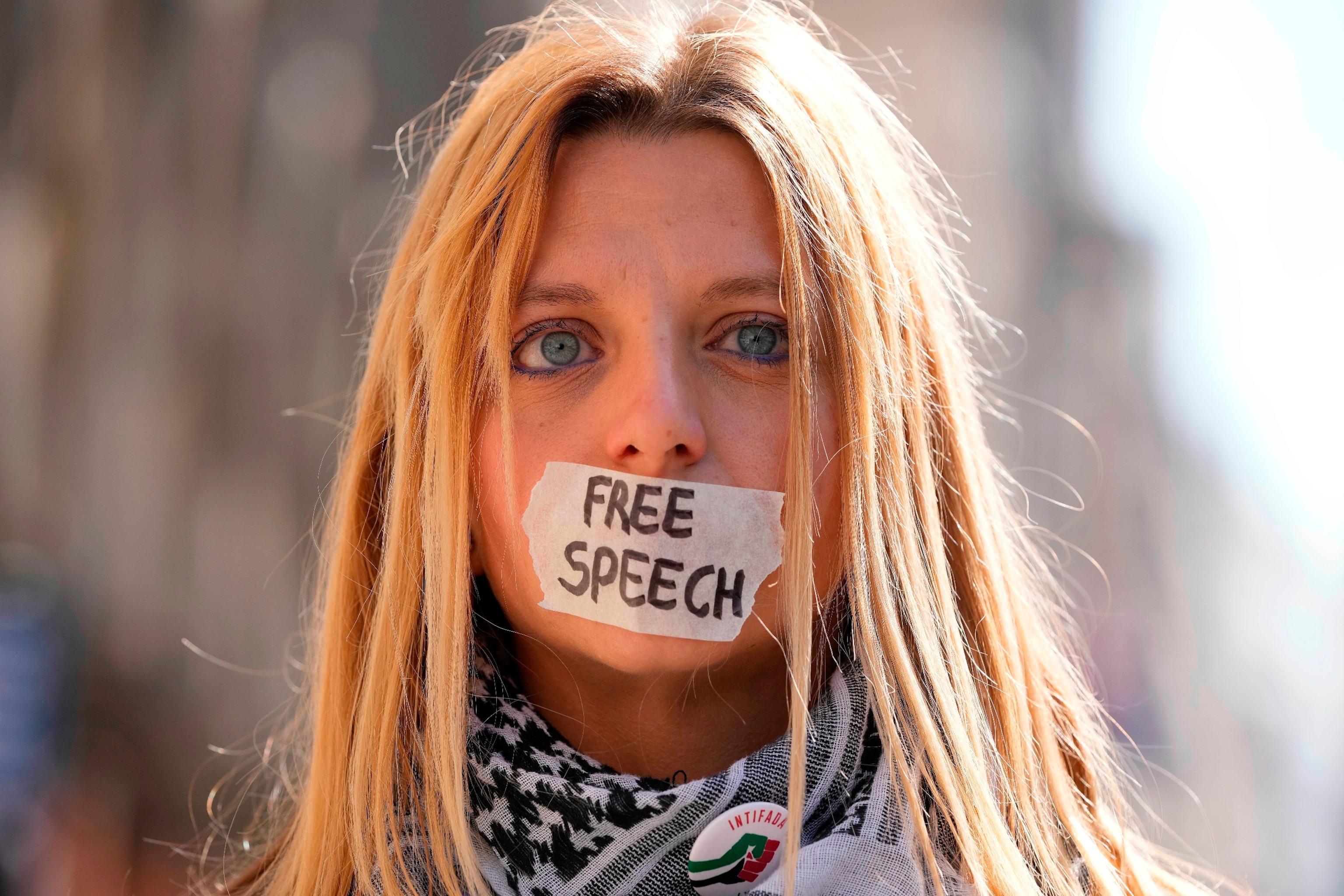 PHOTO: A protester stands outside the High Court in London, Monday, May 20, 2024. 