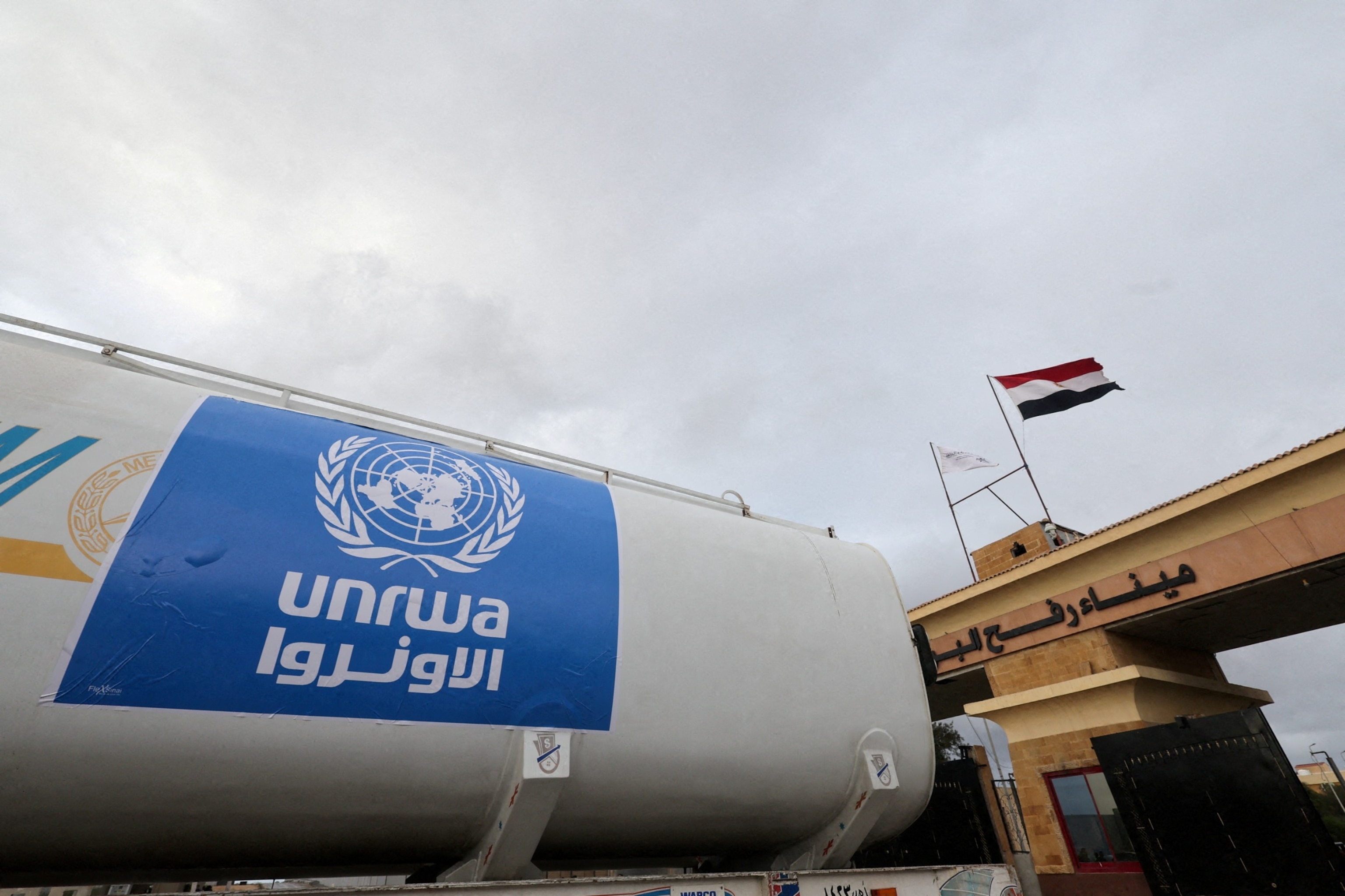 PHOTO: A truck, marked with United Nations Relief and Works Agency (UNRWA) logo, crosses into Egypt from Gaza, at the Rafah border crossing between Egypt and the Gaza Strip in Rafah, Egypt, Nov. 27, 2023. 