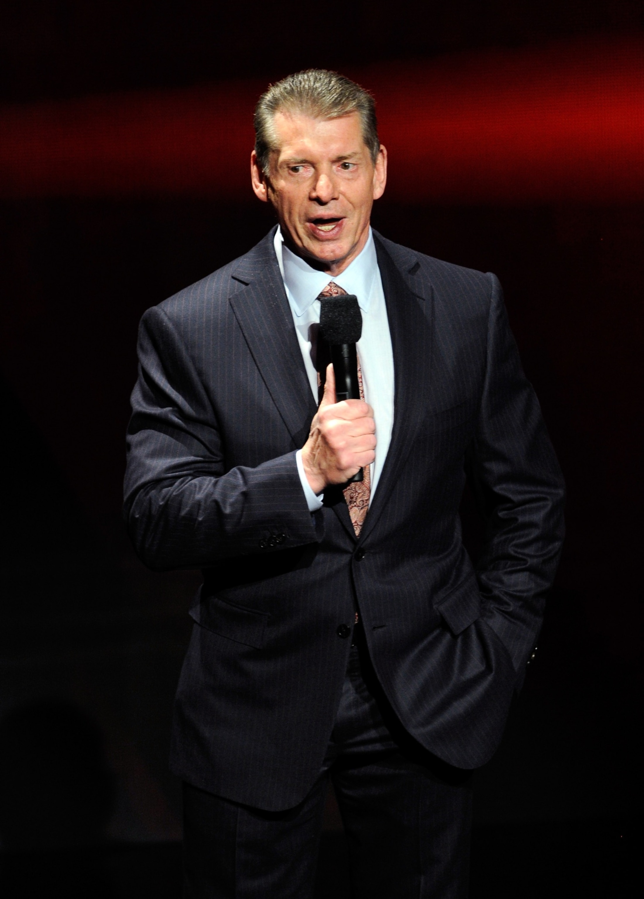 PHOTO: Former WWE Chairman and CEO Vince McMahon speaks at a news conference announcing the WWE Network at the 2014 International CES at the Encore Theater at Wynn Las Vegas on Jan. 8, 2014 in Las Vegas.