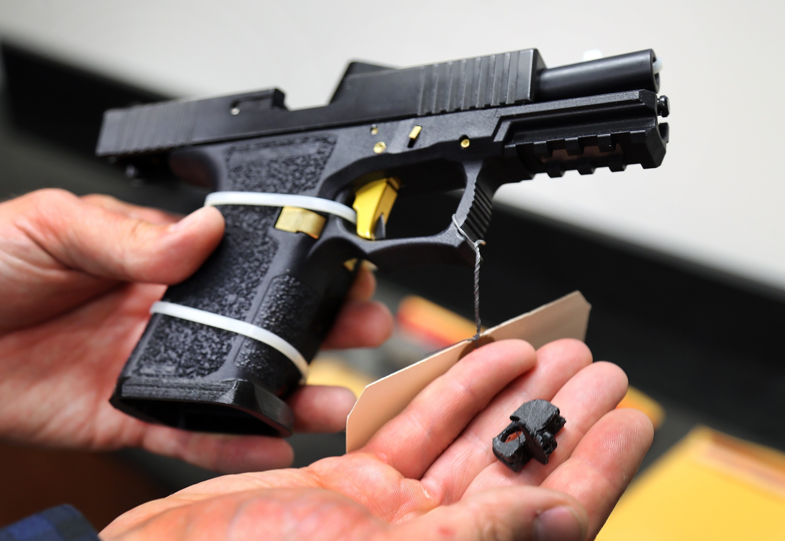 PHOTO: A machine gun conversion device for a Glock hand gun was in custody of the ATF Boston Bureau.