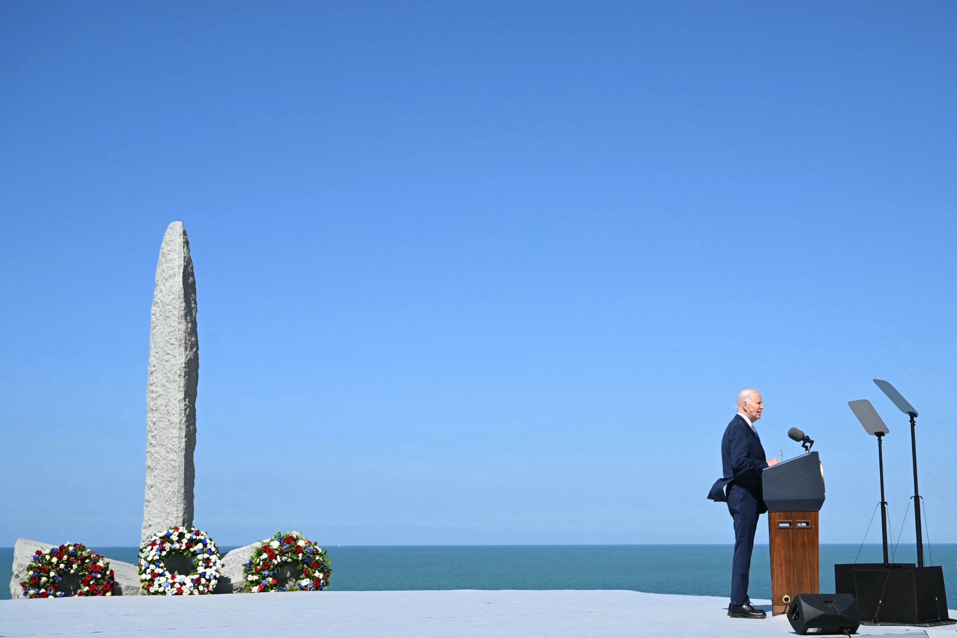 PHOTO: President Joe Biden delivers a speech near the monument on "Pointe du Hoc" clifftop in Cricqueville-en-Bessin, northwestern France, June 7, 2024,
