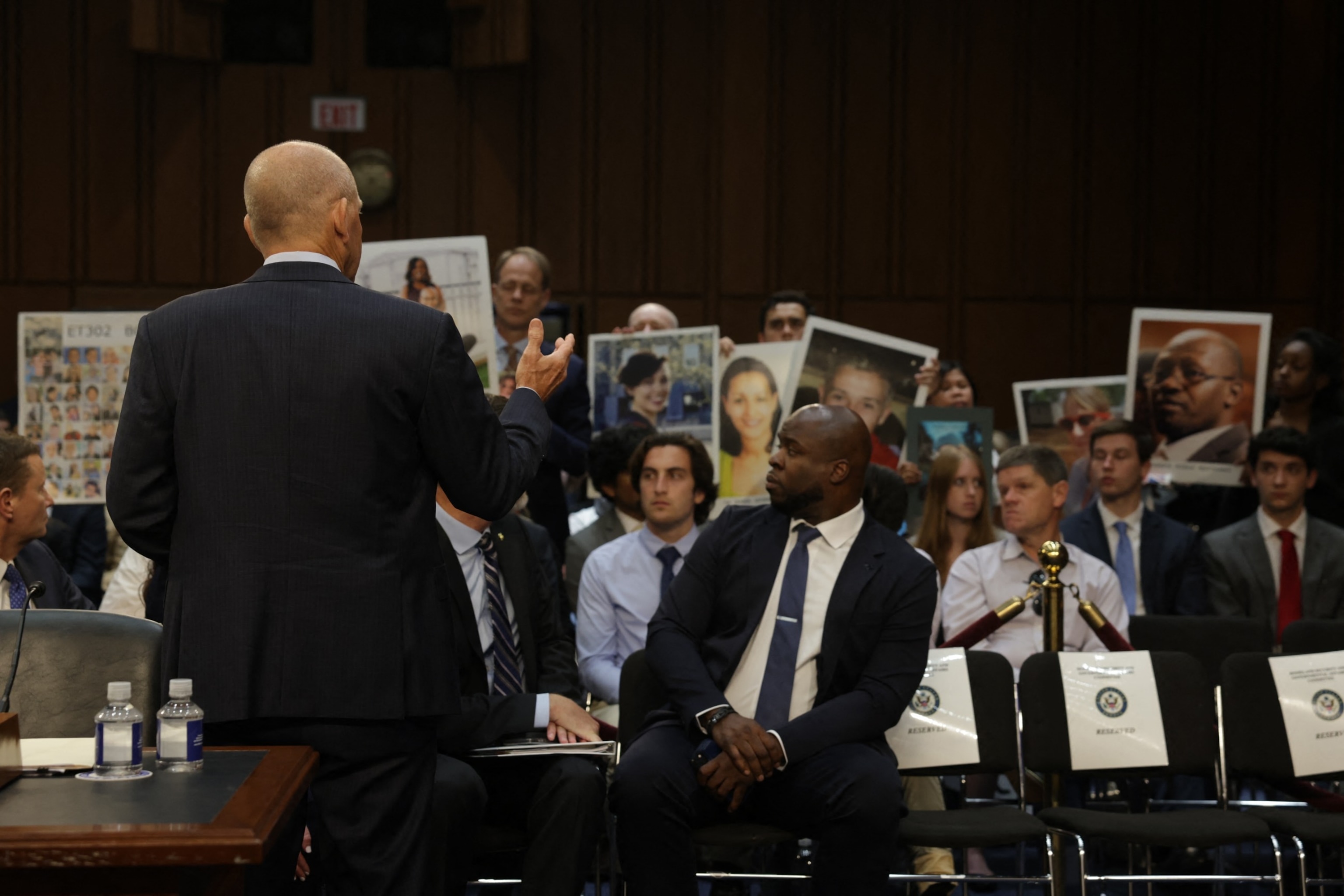 PHOTO: Boeing President and CEO Dave Calhoun addresses relatives of Boeing airplane crash victims before he testifies at a Senate Homeland Security and Governmental Affairs Committee Investigations Subcommittee hearing on Capitol Hill, June 18, 2024.